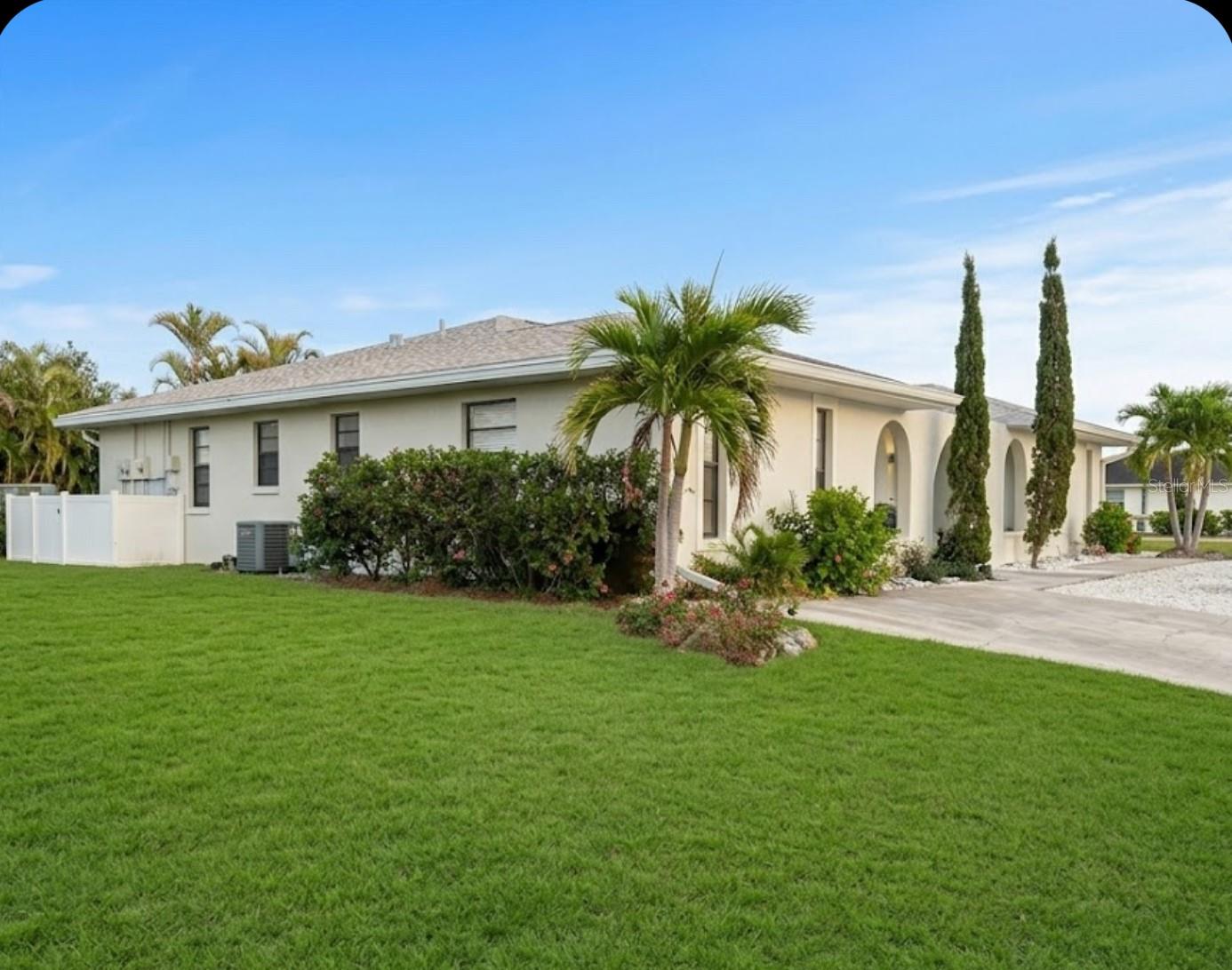 Located in Oakland Hills in Rotonda West Community on Boundary Blvd. This is also located in Charlotte County, even though so close to Sarasota County line.
There is a Huge Mango Tree. I love this cause every year beautiful fruit it produces large mangos. There is a canal hooked up system if ever wanted to water lawn or use the sprinkler system since duplex is on city water so it can be expensive to water lawn without it.Currently it has never been used so unaware since older if working condition. Although it is set up to canal already so always could set it up if choose to. The Roof is new from December of 2022 and the ac unit is newer in unit B. The Showers and toilets tile walls tub in both units are updated. The kitchens both are identical and new with new appliances in all units washer dryer and fridge and icemaker garbage disposal hooked up. Unit A had all walls inside entirely redone after Hurricane in 2022. Unit B had partial inside redone rooms. Mainly Kitchen and master bedroom and part of dining and living room.  Both porches are new rescreened and floor porch repainted textured and front entry’s. 
The units have been repainted inside and new fixtures such as faucets and water heater and also new floor tile in both units flooring . Only Unit B has entry and kitchen tile prior .  The yard is huge and on the left there is an empty lot so more space empty cleaned land next door. 
There is RIng security camera on UNIT A doorbell hardwired that view shows entire front view. There are expensive SMart locks on both front doors. Can operate anywhere with WiFi  and unlock doors and change codes. Also locks can set up hook up with ability of system which automatically will change the codes for each booking automatically .
There is outside UNIT B has on right side a white fence for garbage cans . Larger fence and also unit A side fence is smaller.  There is a private storage room and washer and dryer room all in one attached door entry from back porch.  The porch faces Canal view. SO Peaceful Wildlife… Alligators can be swimming in canals and not fenced in.