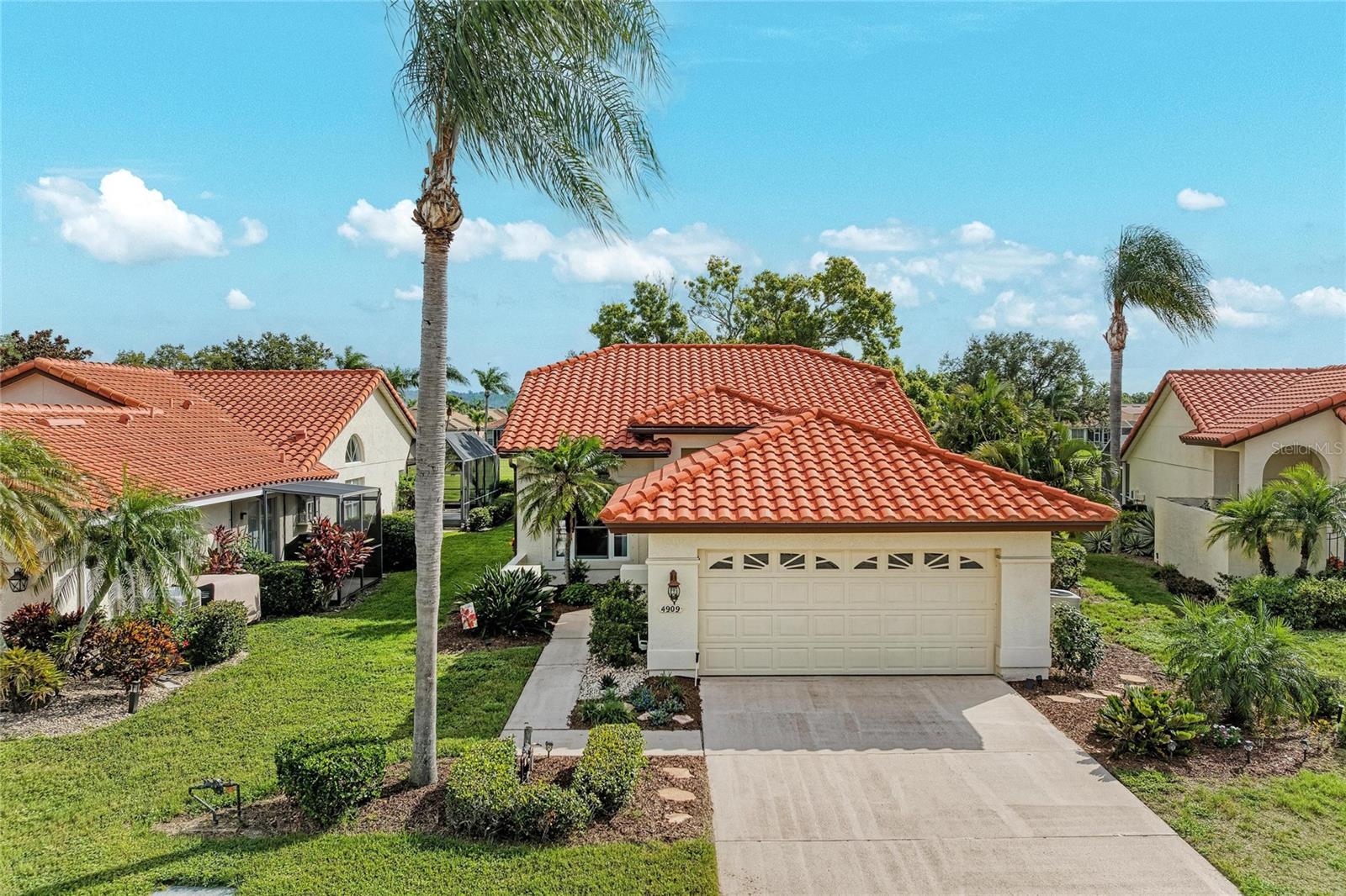 Looking for a fully furnished, move-in-ready golf course retreat? Welcome to an exceptional single family home, perfectly situated along the first fairway of Peridia Golf & Country Club, where timeless elegance meets effortless Florida living. Meticulously updated with over $35,000 in premium improvements, this residence is truly a rare offering.

Every detail has been thoughtfully curated, including new Andersen impact-resistant, heat-reflective windows with hurricane shutters (2024), a newly rescreened lanai, updated soffits, a beautifully reimagined primary en-suite bath, newer water heater, an upgraded walk-in shower, a new Moen kitchen faucet, fresh interior paint, and sophisticated dual raised vanities. Soaring ceilings, an airy open layout, and a refined neutral palette create a bright, elegant ambiance throughout.

Designed for seamless single-level living, the home effortlessly blends indoor and outdoor spaces. Expansive retractable sliding glass doors lead to an oversized screened lanai overlooking the lush fairways, creating a private sanctuary for morning coffee, sunset cocktails, or entertaining—all with the added luxury of no rear neighbors.

Luxury vinyl plank flooring enhances the main living areas, primary suite and guest bedroom while the chef-inspired kitchen is appointed with granite countertops, crisp white cabinetry, a spacious pantry, a charming breakfast nook, and an oversized breakfast bar that serves as the perfect gathering place for family and guests.

The home's exceptional curb appeal is complemented by recent exterior enhancements, including a professionally soft-washed tile roof and exterior, freshly mulched and re-designed landscaping, and a garage door professionally cleaned, treated, and repainted in March 2025. Nestled on a quiet cul-de-sac just steps from the clubhouse, this residence offers the ideal balance of privacy and convenience.

Experience the coveted lifestyle of Peridia Golf & Country Club, where residents enjoy an 18-hole executive golf course, tennis and pickleball courts, a heated resort-style pool with Tiki Bar, an elegant clubhouse with dining, and a vibrant calendar of social events. Even more impressive, the low HOA fee includes cable, internet, and lawn maintenance, with no CDD fees, making this one of the Gulf Coast's most desirable and affordable golf course communities.

Ideally located just minutes from I-75, the UTC shopping and dining district, premier healthcare, and the world-famous white sand beaches of Florida's Gulf Coast, this exceptional home also offers convenient access to Tampa International, Sarasota-Bradenton International, and St. Pete–Clearwater International airports—placing the very best of Florida within easy reach.