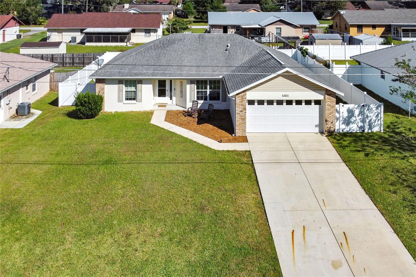 This 3 Bedroom 2 Bath open floor plan home with a vinyl fenced in back yard is in the established Countryside Estates 1st Addition. It is move in ready and has boxes checked any home seeker wants. Home features a New Stainless Stove, Dishwasher, and Microwave. Roof and HVAC were new and permitted in 2013. It has laminate flooring throughout with tile in the kitchen and baths. There is a eat-n-kitchen with bay windows. Need more eating space, there is a dining room to fill the larger need. The two extra bedrooms are on one side of the home while the master bedroom is on the other. The laundry room is inside and the 2-car garage is large enough for your vehicles. There is even a special enclosed lanai that has size for you and your guests. Sellers are given a Home Warranty with purchase so that added confidence to buy is provided. Call me today to see your new home today and take advantage of this bargain or I can Facetime if not local.