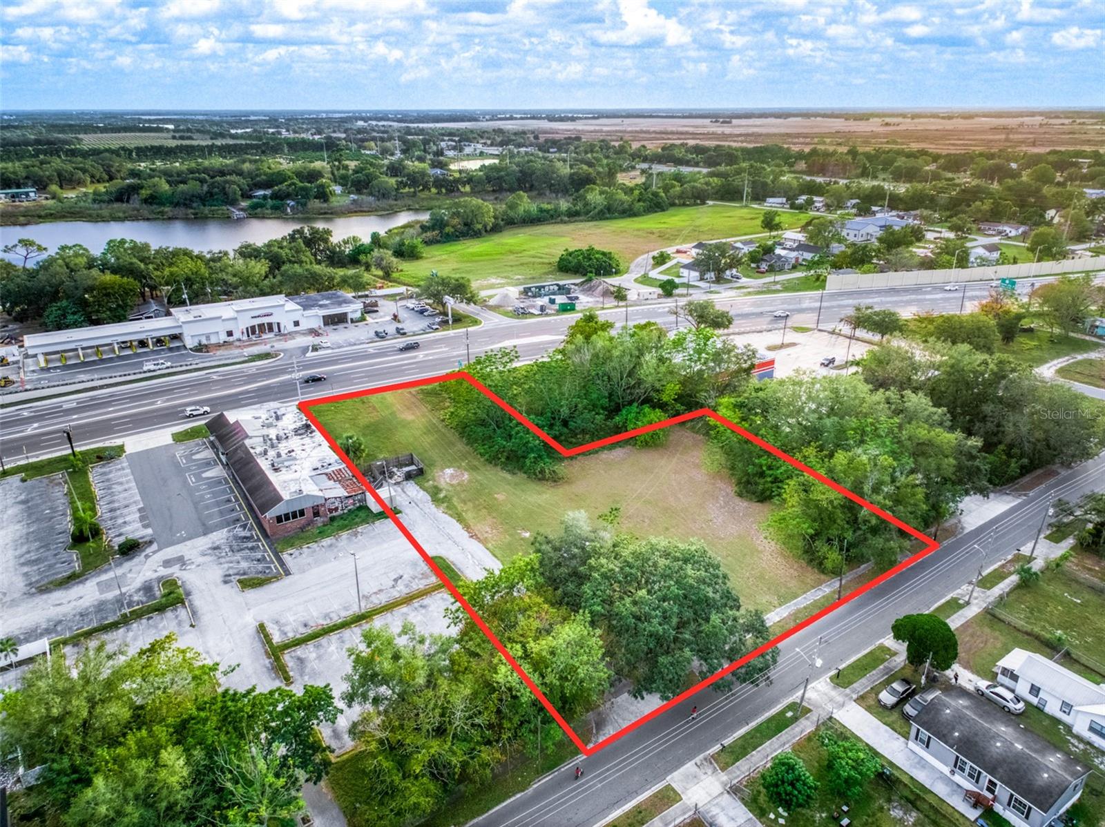 There are 2 lots that front State Road 60, W. in Lake Wales, The parcel on the East side is the former Manny's Restaurant.  Two  lots west is another commercial business The 3 lots behind the front 2 parcels have access/ frontage to Bullard Ave. 
There are a total of 5 lots included in the purchase / sale of this property. The Future Land Use is Residential Office and the Zoning is Professional use according to the City Of Lake Wales.
There is a total of approximately 1.13 acres. Mid Florida Credit Union is across the highway. The SR 60 / US 27 exit is just west of this property so an excellent location for a new business!
All information should be verified by buyer and with the City of Lake Wales during the Buyer's Due Diligence Period.

Buyer is advised to obtain a Survey. Buyer is Responsible to verify exact location of property by obtaining a current survey. Seller, Listing Agent, Broker will not be held liable for cost of survey if buyer not satisfied with the location of the property after survey is completed.
