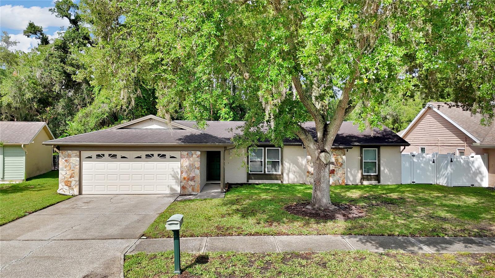 Amazing opportunity to own this well-maintained 3 bedroom, 2 bathroom home in the desirable Forest Lakes community of Oldsmar, Florida! Major bonus - a brand NEW ROOF with warranty will be installed prior to closing, and the new homeowner will have the opportunity to choose the roof color! Situated on a beautiful CONSERVATION homesite, this home offers privacy and peaceful views from the oversized covered and screened outdoor living space , perfect for relaxing or entertaining year-round. The thoughtfully designed floor plan features a private primary suite located separately from the secondary bedrooms for added comfort and functionality. Enjoy multiple living areas including a spacious main living room, a formal dining area, and an additional flex/living space just off the kitchen, providing plenty of room for everyday living and gatherings. The backyard offers both privacy and space to enjoy the outdoors while taking in the serene conservation backdrop. Other NOTABLE FEATURES include IMPACT WINDOWS, IRRIGATION SYSTEM, and GUTTERS with gutter guards (majority of home). Residents of Forest Lakes enjoy fantastic amenities including pool, playground, splash pad, tennis courts, basketball courts, walking trails and access to the Oldsmar Trails and recreation center. With convenient access to shopping, dining, top-rated schools, Tampa International Airport, and the beautiful Gulf beaches this home will surely check all the boxes. Schedule your private showing today!