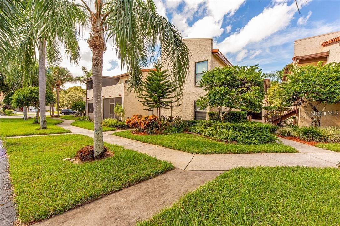 WEEKLY RENTALS ALLOWED & DEEDED BOAT SLIP INCLUDED! Bring your boat and enjoy world-class bass fishing right from your back door! This fantastic, ground-floor 1-bedroom, 1-bathroom waterfront condo offers the ultimate low-maintenance lifestyle or an incredible income-generating investment. The open and bright floor plan seamlessly combines the kitchen and living areas, highlighted by durable laminate flooring throughout—no carpet here! In addition to the spacious primary bedroom, you’ll love the large, light-filled sunroom with vinyl windows, perfectly utilized as a den, home office, or guest space. For ultimate convenience, the washer and dryer are located right inside the unit. Step outside your rear enclosed porch straight onto the deck, fire up the grill, or hop on your boat docked in your private, deeded slip on the canal leading directly out to spectacular Lake Tarpon. Located in a pristine community featuring a sparkling pool, heated spa, clubhouse, boat wash, and vehicle storage. Just minutes from award-winning Gulf beaches, championship golf, shopping, and dining. Don't miss this turnkey waterfront gem—schedule your tour today!  Community features Pool / spa cabana for entertaining great open views of Tarpon Lake.BRING YOUR TOOTH BRUSH !!!