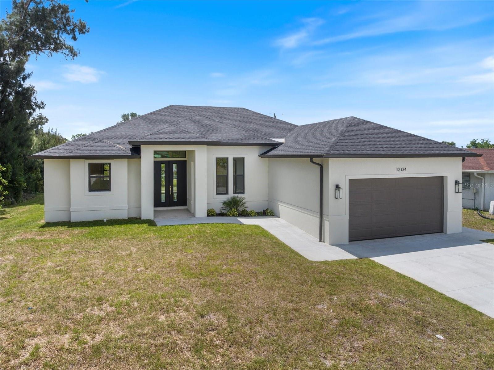 Located in the highly desirable area of North Port and very close to the world-famous Warm Mineral Springs, this stunning new construction home offers the perfect combination of luxury, comfort, and modern design. With over 1,900 square feet of living space, this beautifully built residence features 3 spacious bedrooms, 2 full bathrooms, and a flexible den/office space that can easily be used as a home office, playroom, or guest room.

Step inside to an inviting open floor plan with tall ceilings and elegant finishes throughout. The home showcases custom tile work and tile flooring throughout the entire home, creating both style and easy maintenance. The spacious living and dining areas flow seamlessly into the kitchen, making this home ideal for entertaining and everyday living.

The kitchen is designed to impress with gorgeous quartz countertops, solid wood cabinetry, ample counter space, and modern finishes that bring both beauty and functionality together. The large master suite serves as a private retreat, featuring two walk-in closets and a luxurious en-suite bathroom complete with a soaking tub, walk-in shower, and double vanity setup.

Enjoy Florida living from the covered lanai, perfect for relaxing mornings or evening gatherings. Conveniently located near shopping, dining, parks, schools, and just a short drive to Gulf beaches, this home offers the ideal blend of peaceful living and accessibility. Don’t miss the opportunity to own a beautifully crafted new construction home in one of Southwest Florida’s fastest-growing communities.