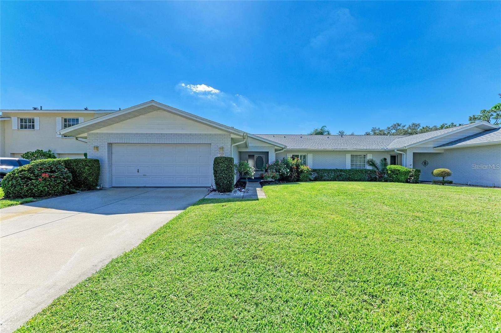 You won't want to miss this open and spacious 2/2 Maintenance Free Villa with a huge den/office (possible third bedroom). Located in desirable Pinehurst Village Community within the Palm Aire Country Club Neighborhood. This home is nestled in this lovely quiet serene neighborhood. You will find this home features a large open Living - Dining room concept with vaulted ceilings, A full sized eat in kitchen with Quartz Countertops and GE appliances.    A very spacious master bedroom features a private bath and over sized 6'x 10' walk-in closet. Plenty of room for family and friends in the second bedroom which also features its own walk in closet. Huge glassed in, tiled lanai off the living room, master bedroom and den. Easy to maintain ceramic tile and luxury vinyl thru out this magnificent home. Spacious two car garage with storage cabinets, workbench and overhead an overhead rack to finish off some great storage options. A rather long driveway for off street parking. You'll also find a full size washer and dryer laundry room off the kitchen area. Community pool, Clubhouse for special events you might want to host along with tennis courts. Close to Rt 75, Downtown Sarasota, Bradenton and the Beautiful Gulf Beaches, Golf Courses, UTC Mall, the upcoming Mote Aquarium, shopping and dining. Minutes to SRQ Airport, and a short drive to TPA, RSW, PGD airports are 60-90 mins away. This is the perfect location to enjoy the Florida life style. Enjoy the mixture of Villa's, Condo's, Single Family Homes that make living amongst the many preserves and lakes within a golf course community a pleasure to live. This is the perfect location to enjoy the Florida life style. Located adjacent to Palm Aire Country Club, membership is not required but multiple membership levels are available through the country club.  BETTER HURRY AT THIS PRICE AND IN THIS NEIGHBORHOOD, THIS HOME WILL NOT LAST!!!!!!