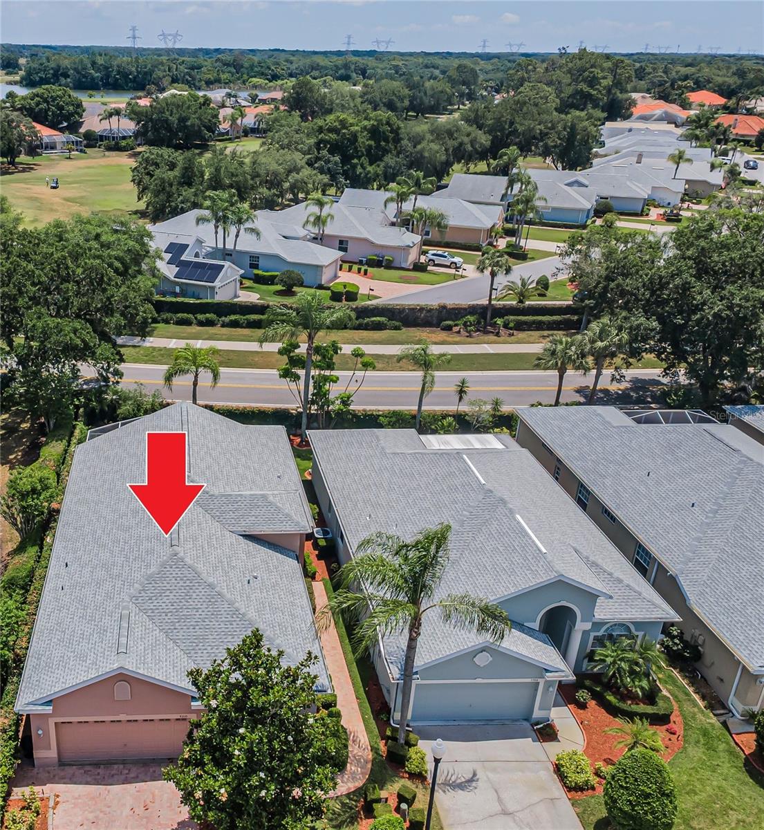 NEW PRICING!  Motivated Sellers! NEW AC July 2026, NEW roof was installed in 2018. Set back on a private lot along a peaceful cul-de-sac, this stunning villa is encircled in pavers accented by lush landscaping; the community is gated. The grand foyer reveals the spacious living room's vaulted ceilings, architectural niches, crown molding, and gleaming porcelain tile floors. A formal dining room features a set of French doors providing entry to the spectacular screened lanai boasting ample square footage to relax, dine alfresco, and host your family's special events and holidays. Multiple sets of sliders not only provide entry from several rooms but lend plenty of natural light. Curved archways and a rich color palate lend ambiance to the recently UPDATED kitchen. Sleekly designed, recessed lighting shines down on granite countertops and the ample storage, courtesy of the cabinetry and its pullout drawers. A lovely window dressed in plantation shutters graces the adjacent breakfast room. The master suite was also recently UPDATED. From the shower room and built-in vanity to the garden soaking tub, you'll relish this retreat and love the two walk-in closets. The second bedroom and its bath are also well appointed. A large den is currently used as an office, but its decorative set of doors and large window lend a versatility to designate this choice space as a personal fitness/yoga center, library, or home theater. The HOA covers exterior maintenance including lawn, trees, bushes, exterior painting, basic cable, trash, and the sparkling community pool. Nestled in the Villages at Fox Hollow, this well-maintained residence is close to the area's restaurants and retail, as well as the countless golf courses and parks, along with all the coastal beauty from Honeymoon State Park to Clearwater Beach to the cultural center that is Tampa. Trinity is the gem of Pasco County.