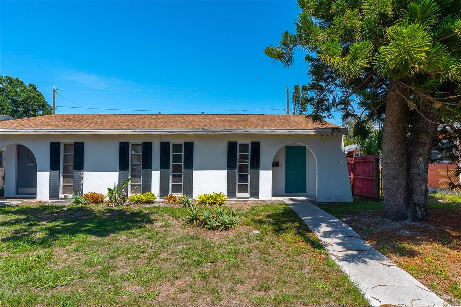 Welcome to your new Gulfport sanctuary! Available immediately and nestled in a convenient location outside of the flood zone, this bright and airy unit offers the perfect blend of comfort and classic charm. The open floor plan features wood-look flooring throughout. The bedroom can accommodate a king-sized bed and includes dual closets, while the bathroom boasts well-maintained yellow tiling that adds a fun touch of retro character that goes with Gulfport's style.

Outside, you'll enjoy a covered carport in the back, street parking for guests, your own laundry space with a washer and dryer, and a private patio space perfect for sipping your morning coffee or relaxing after a long day. The location is truly unbeatable: you're steps away from a local park with an outdoor gym and the Pinellas Trail, 3 minutes from Stetson Law School, and just 4 minutes from the vibrant shops and dining of downtown Gulfport. With quick access to world-class beaches and the heart of downtown St. Pete, you're never far from the action.

Don't miss your chance to make this Gulfport gem your new home! Please note this is a non-smoking property.