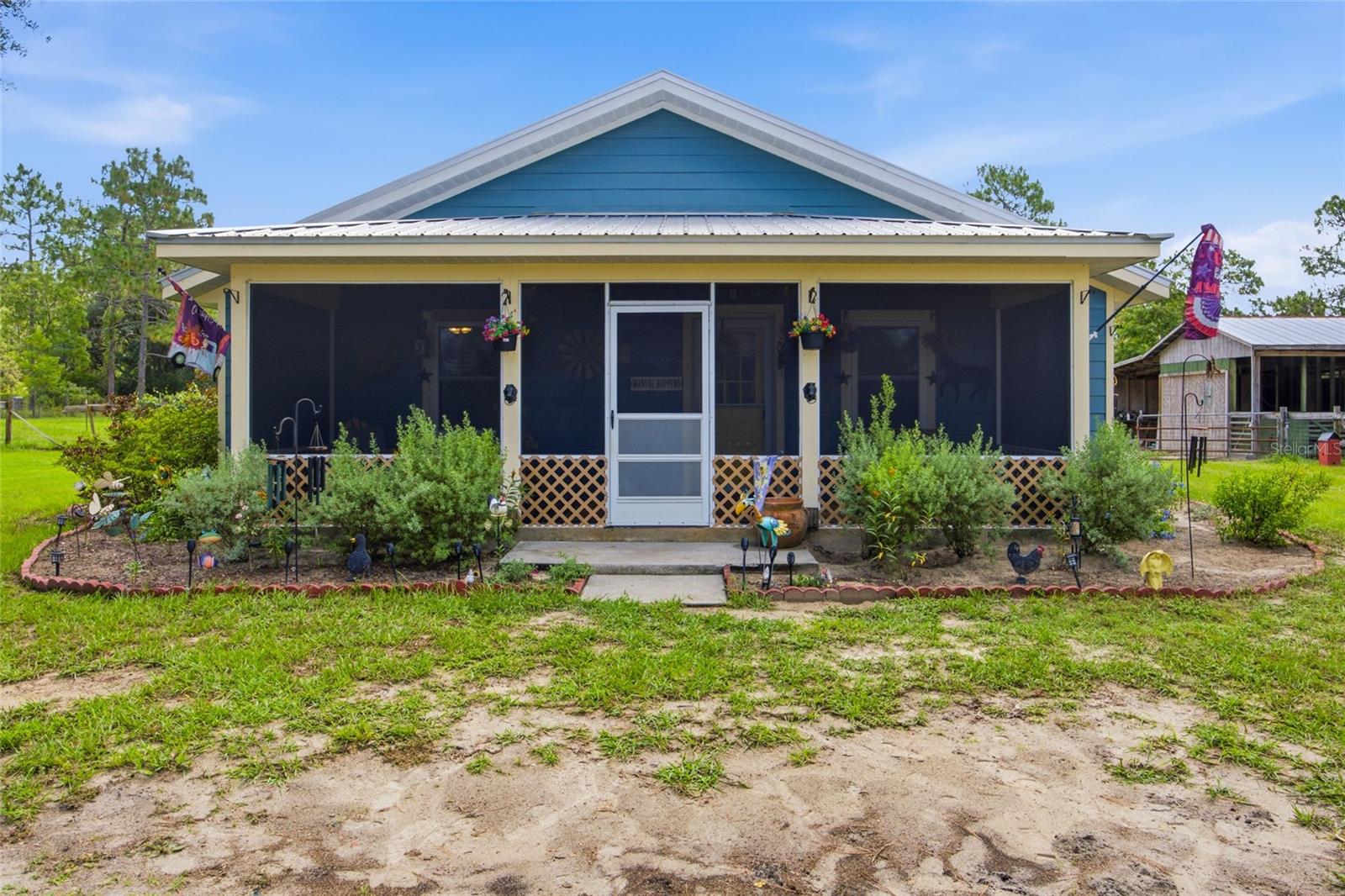 Escape to the heart of Florida's horse country with this charming 5-acre equestrian property located just minutes from Goethe State Forest and Black Prong Equestrian Village. This peaceful property features a 2-bedroom, 2-bathroom home, a versatile den ideal for a home office or flex space, a large screened front patio, and a 2-stall barn ready for your horses. Recent improvements provide peace of mind and added efficiency, including a metal roof, new HVAC system, energy-efficient windows, and a newly screened front patio perfect for enjoying Florida's year-round weather. 
The Goethe State Forest, encompasses more than 76,000 acres of natural Florida beauty with over 100+ miles of trails enjoyed by equestrians, carriage drivers, hikers, cyclists, anglers, campers, and outdoor enthusiasts of all kinds. Even better, these trails can be accessed directly from the Fox Grove Farms neighborhood, making them hacking distance from the property and allowing you to saddle up and ride straight from home.
Enjoy the privacy and tranquility of country living while remaining a short drive from everyday conveniences, dining, and shopping. Whether you're seeking a full-time residence, weekend retreat, or equestrian getaway, this property offers the ideal blend of comfort, recreation, and Florida outdoor living.
Bring your horses, bring your sense of adventure, and experience the lifestyle that makes this area one of Florida's most sought-after equestrian communities.