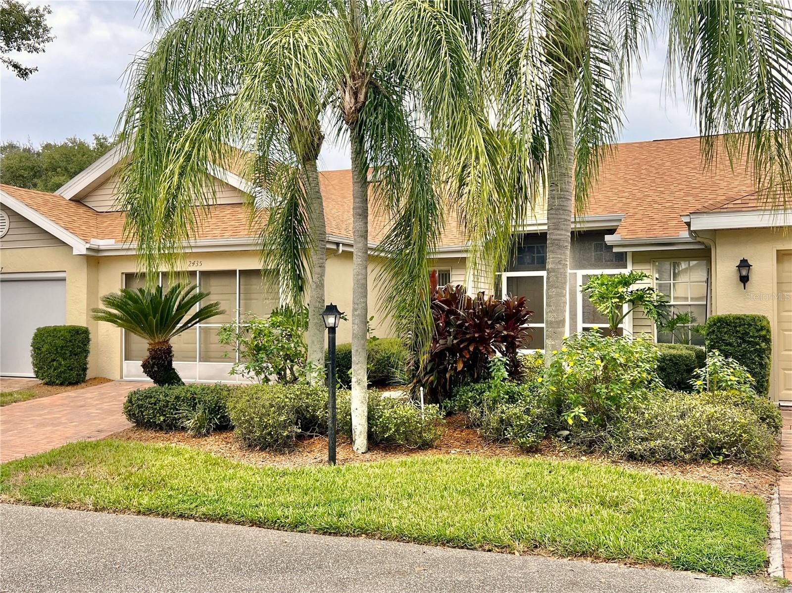 Here's your opportunity to live in beautiful Kings Point at an affordable price! This 2 bed/2 bath villa located in the popular Nantucket III section features 1,125 sq feet of living space, oversized garage with space for golf cart and 140 sq ft screened lanai to enjoy the breezes. Built in 1997, the home includes newer appliances, except for dishwasher; 2021 luxury wide-plank waterproof vinyl flooring throughout, 2023 central A/C and water heater, master suite with large bath and walk-in closet and split bedroom plan for extra privacy. Large open living/dining/kitchen area makes entertaining easy. Cathedral ceiling in living room with niches for plants or collectibles. Lots of storage space including pantry in kitchen, hall closet and above garage storage with pull-down ladder. Comes tastefully furnished. The 55+ community offers maintenance-free living and owners can add to the convenience with a choice of four service plans that cover appliances, H-VAC system and water heater for an additional fee. The $643 monthly maintenance fee covers exterior maintenance including roof, private streets, water/sewer, trash and lawn, cable and internet, 24/7 manned entrance gate, and amenities of Kings Point including 2 swimming pools, clubhouse, tennis, and pickle ball. For the golf enthusiasts, join the Robert Trent Jones-designed 18-hole golf course located within the community. Contact the golf club for membership fees.  Sorry no pets but ESA or service animals are allowed. Kings Point is located in Sun City Center where shopping, restaurants, medical facilities abound. Located minutes from I-75, residents can quickly access Tampa, Bradenton/Sarasota and Anna Maria Island.