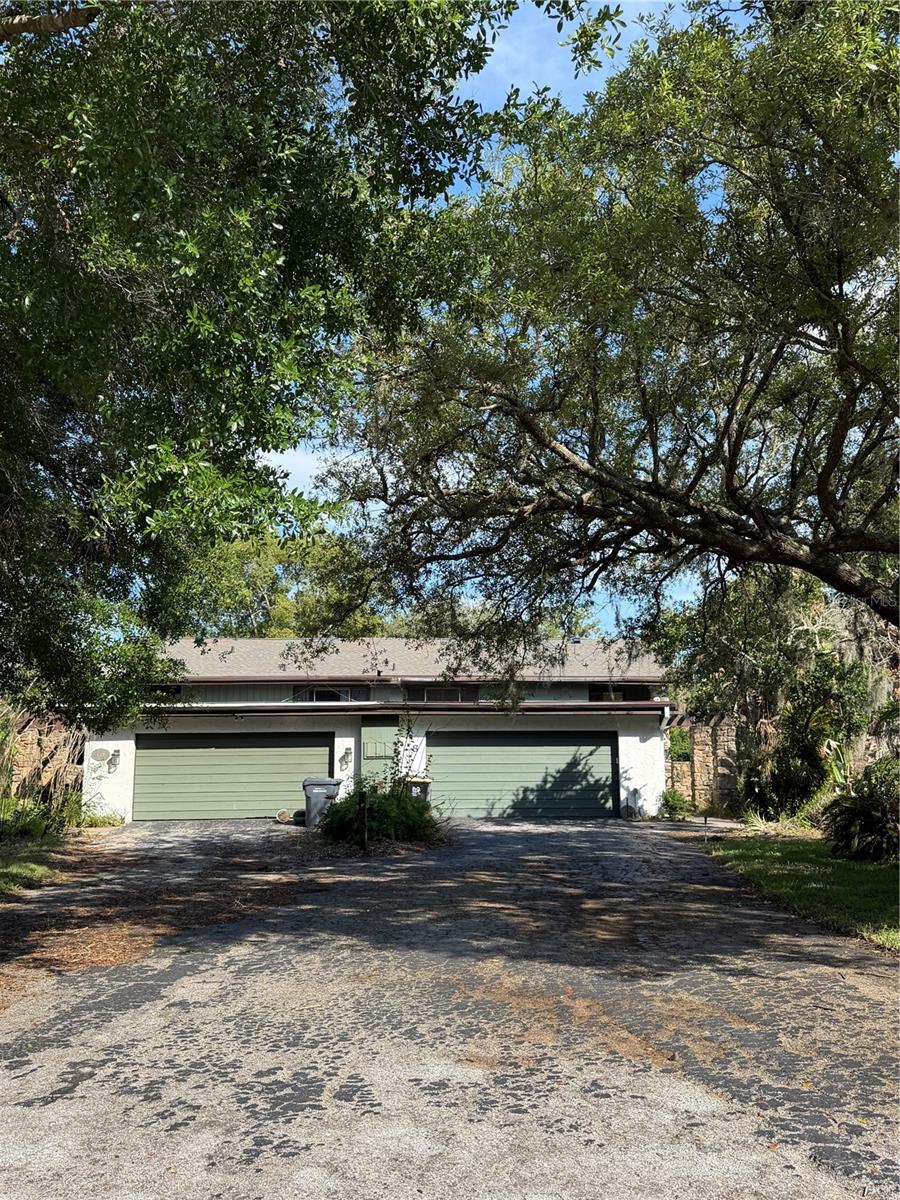 PRICE IMPROVEMENT – INCREDIBLE VALUE! (Haines City, FL) Grenelefe Townhouses: Welcome to this spacious and versatile home located within the established golf community of Grenelefe in the heart of Central Florida. Offering 2 bedrooms, a large bonus room, 2.5 bathrooms, and a 2-car garage with just under 2,000 square feet of living space, this residence combines comfort, character, and flexibility. Major updates include a **new roof (2023), two HVAC units with the upstairs HVAC replaced in 2020, and a completely redone/reinforced balcony with metal posts for added peace of mind and durability. ** Inside, you’ll find soaring main floor vaulted ceilings, abundant natural light, an open dining area, and a spacious great room featuring a built-in bar perfect for entertaining. Wall-to-wall sliding glass doors create a seamless indoor-outdoor living experience while showcasing peaceful greenery views throughout the home. **Enjoy year-round Florida living from the oversized screened balcony/enclosure, ideal for relaxing, dining outdoors, or entertaining guests in a private setting. The expansive primary suite features a unique step-down sitting area overlooking the scenic natural surroundings, creating the perfect retreat. Each bedroom offers its own private full bath, while the bonus room provides endless possibilities for a home office, guest space, media room, or potential third bedroom. **Surrounded by mature landscaping and the tranquil charm Grenelefe is known for, residents enjoy a relaxed lifestyle with optional low HOA fees. Conveniently located near Highway 27 and I-4 with easy access to shopping, dining, golf, medical facilities, and Central Florida attractions. **Whether you’re searching for a primary residence, vacation getaway, or investment opportunity, this home offers exceptional value and potential in one of Central Florida’s fastest-growing areas. **Call today and ask about potential Seller incentives! Don't miss this incredible opportunity and schedule your private showing today!**