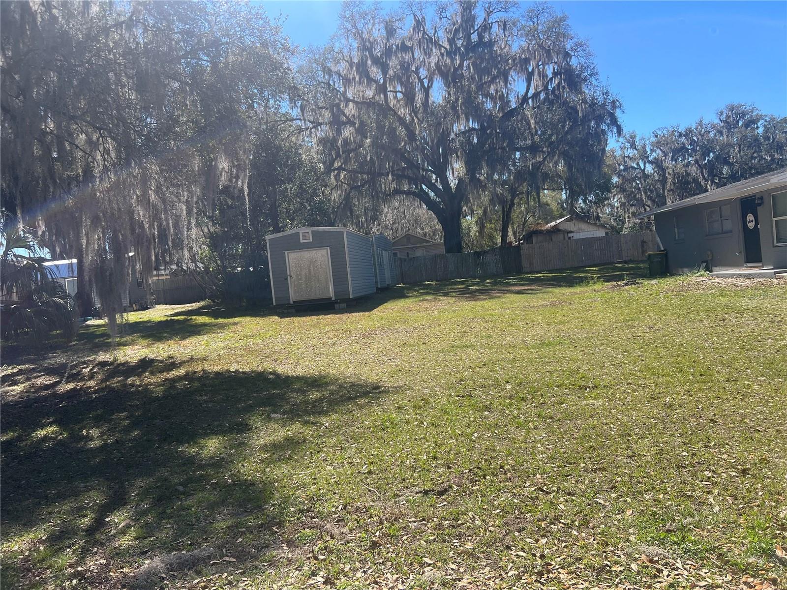 No HOA or CDD's!  Bring your own builder!  Buyer to check with municipality for Water, sewer and electric during due diligence or before.  Sheds will be removed prior to closing.