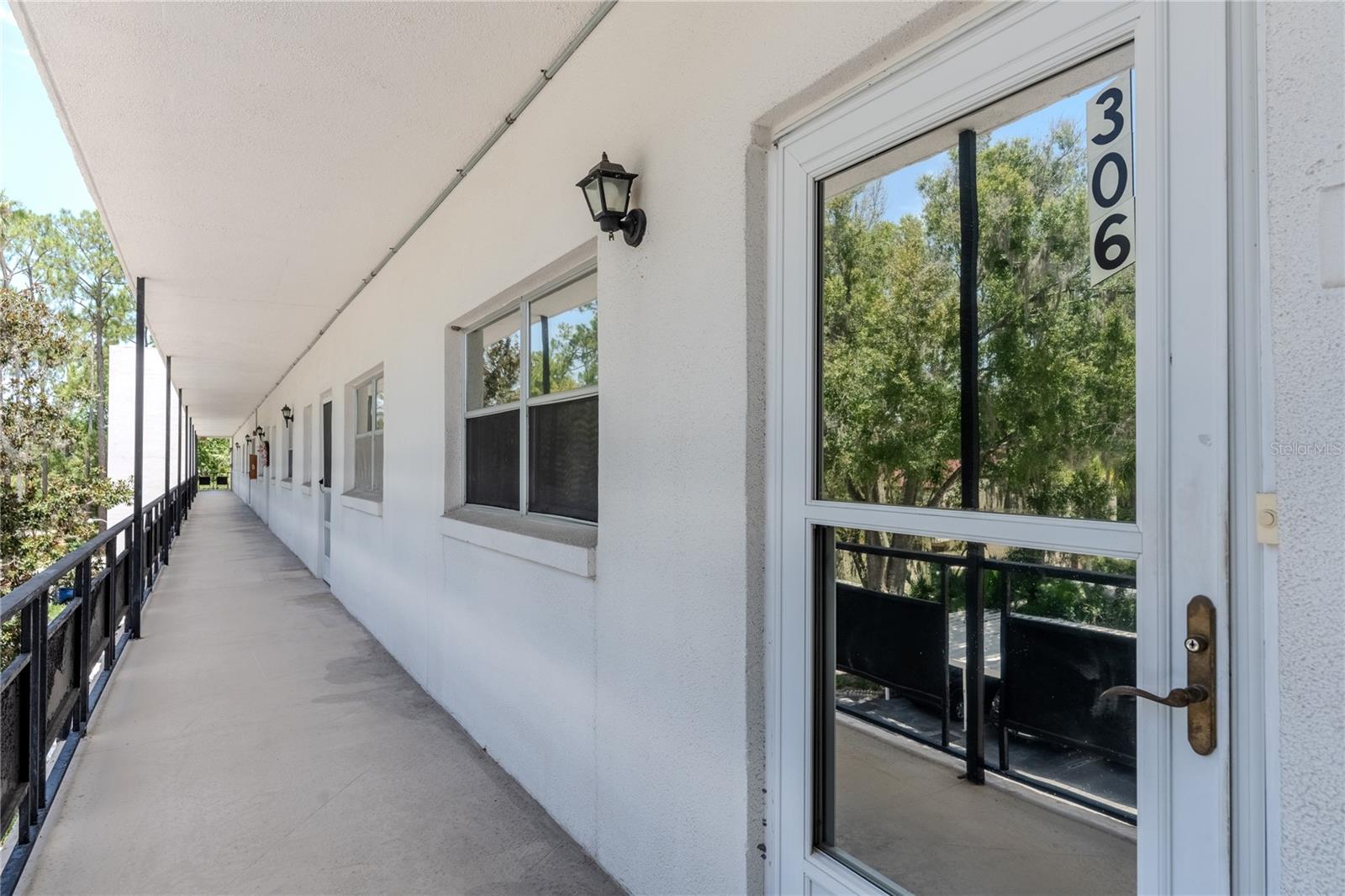 Enjoy carefree Florida living in the desirable Seville Building at Orchid Springs! This well-maintained 1-bedroom, 1-bath third-floor corner unit offers 1,078 square feet of comfortable living space with elevator access and peaceful views of the beautifully landscaped lagoon.
The spacious open floor plan features a large great room with endless furniture arrangement possibilities and an enclosed sunroom that fills the home with natural light while providing the perfect space to relax, work from home, or enjoy your morning coffee. The generous primary bedroom easily accommodates a king-size bedroom suite and includes a walk-in closet, while multiple additional storage closets throughout the home provide exceptional storage.
This corner unit is conveniently located just steps from the elevator, laundry facilities, and stairwell, making everyday living even easier. Improvements include energy-efficient sunroom windows (2016), a newer gas furnace and coil with Honeywell thermostat (2018), repiping/plumbing (2018), building roof replacement for added peace of mind. A reserved parking space is also included.
The monthly HOA fee covers water, sewer, natural gas, trash, exterior maintenance, grounds maintenance, and access to the community clubhouse and sparkling pool, allowing you to spend more time enjoying Florida and less time maintaining your home.
Nestled in the heart of Southeast Winter Haven, Orchid Springs is known for its mature landscaping, tranquil setting, and convenient location. You'll be just minutes from Downtown Winter Haven, the Chain of Lakes, Cypress Gardens Boulevard shopping and dining, Publix, Winter Haven Hospital, Polk State College, and LEGOLAND® Florida Resort. Easy access to US-27 and the Polk Parkway makes commuting to Lakeland, Orlando, and Tampa a breeze.
Whether you're searching for a year-round residence, winter retreat, or low-maintenance home, this move-in-ready condo offers comfort, convenience, and an exceptional Central Florida lifestyle.