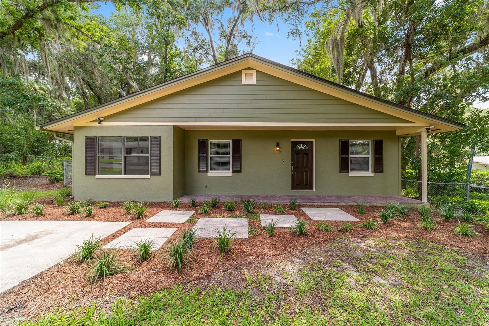 Welcome to this cute and cozy 3-bedroom, 2-bath home nestled on just under 0.40 acres in one of Southeast Ocala’s most desirable locations! Freshly updated and truly move-in ready, this home features fresh interior and exterior paint, new flooring throughout, and a new water heater, giving you peace of mind from day one.
Major updates include a 2021 roof and 2023 A/C, allowing you to focus on enjoying your new home rather than worrying about costly repairs. Step outside to a private, fully fenced backyard offering plenty of room for pets, entertaining, gardening, or simply relaxing in your own secluded outdoor retreat.
Conveniently located just minutes from downtown Ocala, shopping, dining, medical facilities, and situated within a highly desirable school district, this home combines comfort and location.  You’ll enjoy extra space that’s hard to find at this price point.