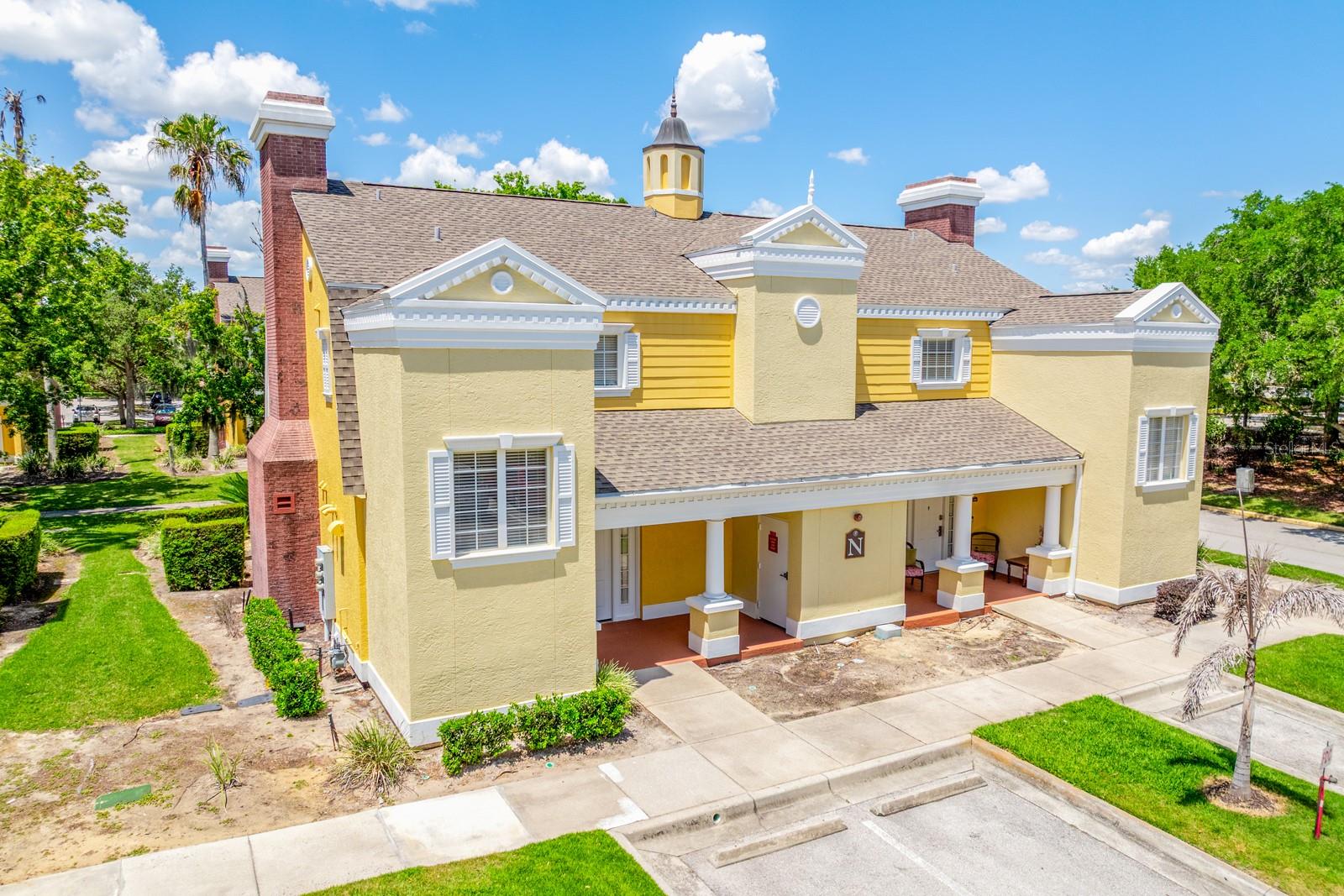 Seller may consider buyer concessions if made in an offer**Welcome to this ELEGANTLY APPOINTED 3-bedroom, 3-bath residence in the HIGHLY DESIRABLE, GUARD-GATED Seven Eagles enclave of Reunion, offering over 2,100 SQUARE FEET of beautifully designed living space across two expansive levels. With the feel of a private townhome and the advantage of a CORNER-UNIT LOCATION, this fully furnished property delivers both refined comfort and exceptional versatility. From the moment you enter, you’ll notice the home’s GRACEFUL ARCHITECTURAL DETAILS including arched doorways and tray ceilings, creating a chic and inviting atmosphere throughout. This residence is also part of the EXCLUSIVE KINGWOOD INTERNATIONAL RESORT MEMBERSHIP, a rare and valuable distinction that elevates both lifestyle and investment potential. The first level features two generously sized bedroom suites, each offering PRIVATE EN SUITE BATHS and DIRECT ACCESS to the rear patio through sliding glass doors, seamlessly blending indoor and outdoor living. One suite showcases a SPA-INSPIRED TOUCH with an open-concept Master Bath boasting a garden tub, granite countertop vanity, step-in shower and private water closet. A conveniently located LAUNDRY CLOSET completes this level. Upstairs, the home opens into a LIGHT-FILLED living space designed for both relaxation and entertaining. The Kitchen, Dining, and Living areas flow effortlessly together, enhanced by WOOD-LOOK LAMINATE FLOORING and a refined sense of openness. The Kitchen is both stylish and functional, featuring crisp white cabinetry, GRANITE COUNTERTOPS, stainless steel appliances, and a pass-through to the Dining area. The Living/Dining Room is beautifully accented by a TRAY CEILING and modern ceiling fan, with sliding doors that lead to a PRIVATE BALCONY, offering a peaceful setting for morning coffee or evening unwinding. The Primary Suite, also located on the upper level, serves as a tranquil retreat, complete with private balcony access and a DISTINCTIVE LAYOUT that includes a garden tub within the bedroom space. The EN SUITE BATH features a step-in shower and a granite-topped vanity, completing the suite with both style and functionality. Residents of Seven Eagles enjoy access to RESORT-STYLE AMENITIES, including access to 12 pools, while OPTIONAL Reunion Club membership unlocks an elevated lifestyle with access to a water park, championship golf courses, fine dining, and a relaxing lazy river experience. IDEALLY SITUATED in Reunion, this property places you just moments from WORLD-RENOWNED DESTINATIONS like Walt Disney World Resort, as well as premier shopping, dining, and entertainment. CONVENIENT ACCESS to Interstate 4 ensures effortless travel to Orlando, UNIVERSAL ORLANDO RESORT, and beyond. Whether you’re seeking a luxurious vacation retreat, an INCOME-PRODUCING INVESTMENT, or a full-time residence, this exceptional property offers a rare opportunity to enjoy the very best of RESORT-STYLE LIVING in one of Central Florida’s most sought-after communities. This is one you’ll want to see in person—schedule your private tour today!
