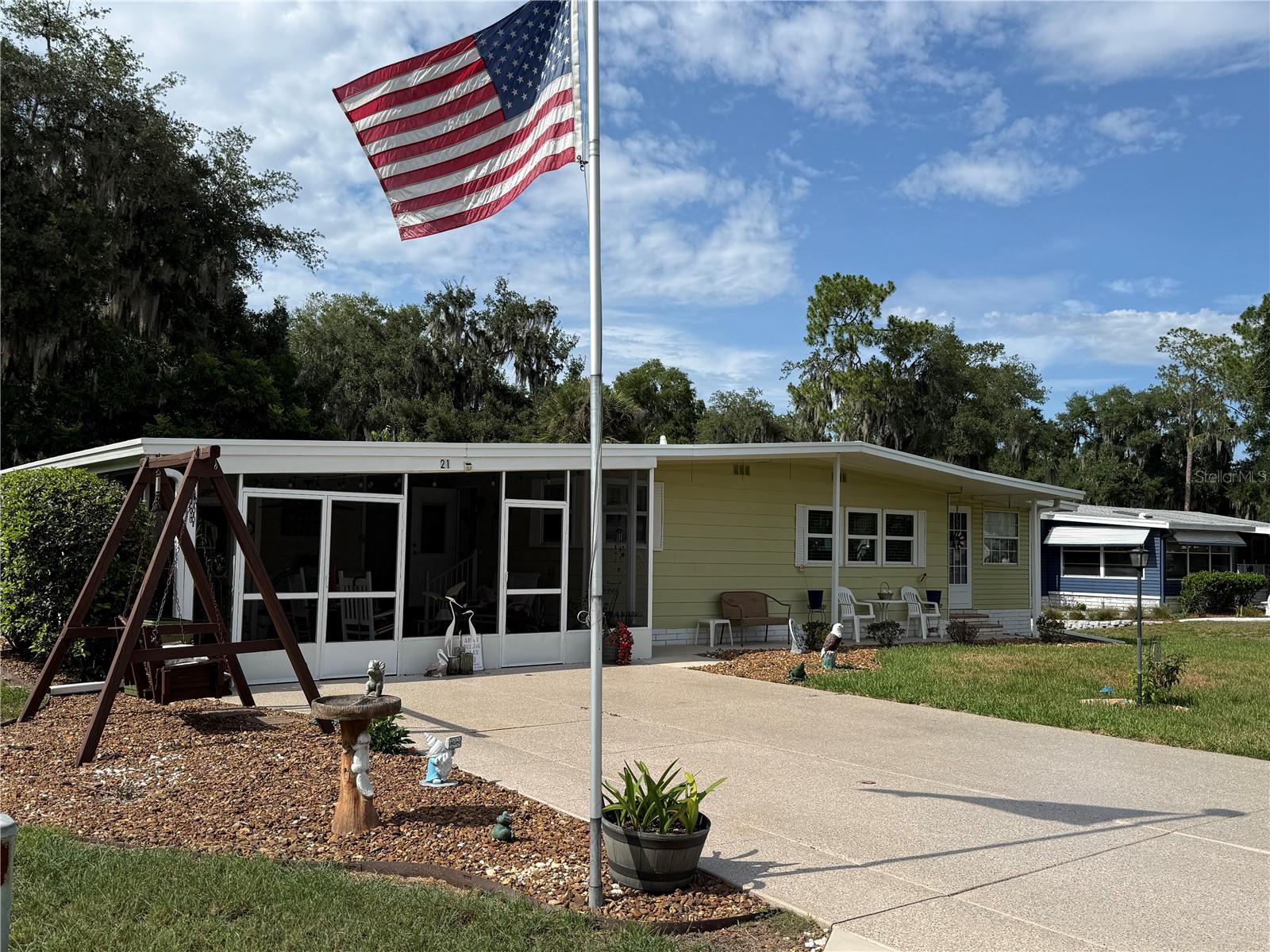 THIS BEAUTIFULLY MAINTAINED 2/2 HOME IN CONTINENTAL COUNTRY CLUB delivers that warm, welcoming Florida feel the moment you arrive—newer roof, newer vapor barrier, newer flooring, newer window, and a newer screen room that could easily be converted into a garage or kept as an oversized flex-space for hobbies, storage, or gatherings. The property also includes a dedicated storage building for your golf cart, plus tons of additional storage inside and out, including a full laundry room. Step inside and you’ll love the open floor plan, the comfortable flow, and the built-in features that make this home feel both spacious and functional. It truly lives like two master suites, perfect for families merging, long-term guests, or anyone wanting privacy while still enjoying shared living spaces. The Florida room is bright, inviting, and ideal for morning coffee, movie nights, or extra guest space. Outside, the double painted driveway, easy-care landscaping, and manicured yard make this home as attractive as it is practical. Located in the highly active, gated golf community of Continental Country Club—just two minutes to The Villages, shopping, dining, dancing, doctors, swimming, and endless activities—this home offers the lifestyle everyone is looking for. With updates already done and comfort built into every corner, this one is absolutely ready for you. Come see it, fall in love, and make it your home today. The home comes with an Resident Owner Certificate and Golf Charter Membership, golf cart and a golf cart garage too!!