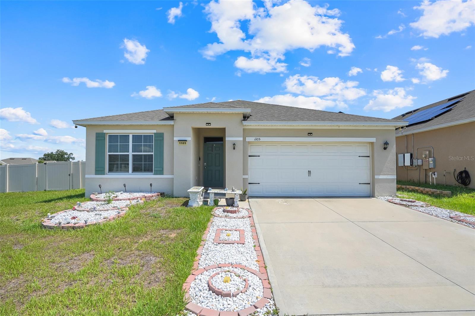 Welcome to 1105 Torrente Lane in Magnolia Park, a clean and well-maintained 3-bedroom, 2-bath home built in 2023. This single-story home offers approximately 1,725 sq ft, an open main living area, granite countertops, a functional kitchen layout, and a 2-car garage. The outdoor space is a major plus, featuring a private fenced backyard, paved outdoor area, and screened-in patio that add low-maintenance usable space for relaxing, dining, or entertaining. Magnolia Park offers community amenities and convenient access to US-17, Hwy 27, shopping, dining, and nearby Lake Eva Community Park and Event Center. A strong option for buyers looking for a newer home with practical upgrades, outdoor living space, and a convenient Haines City location.