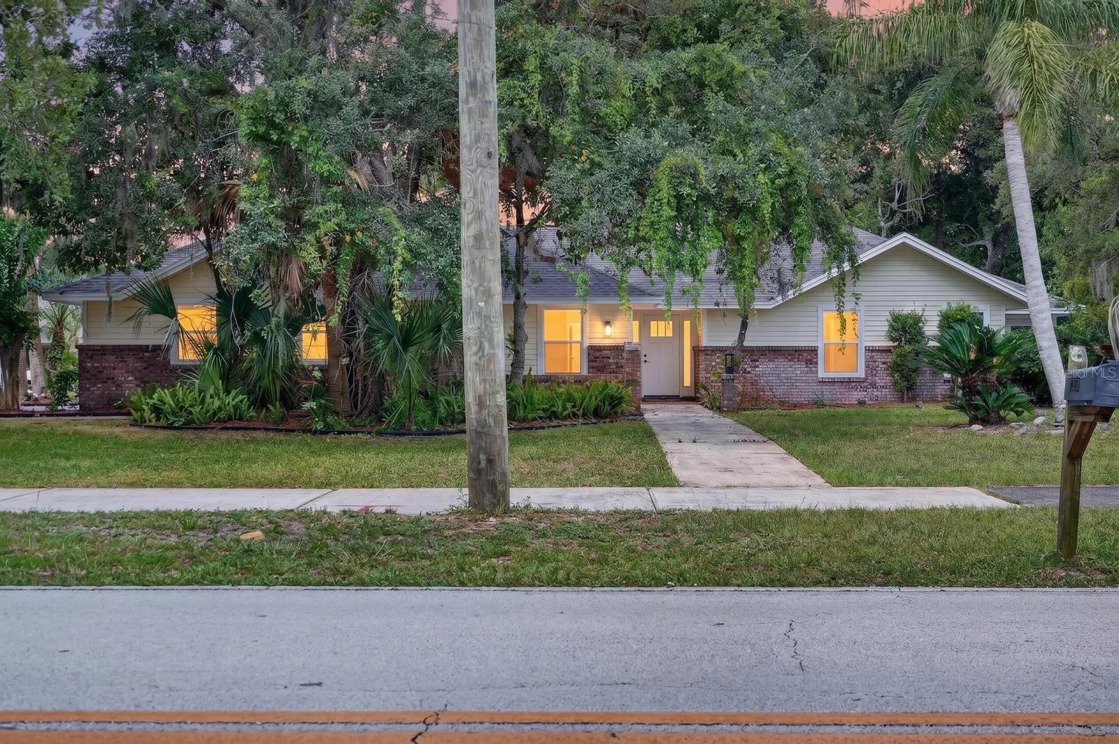 This beautifully updated coastal ranch-style home is tucked away on a corner lot in a quiet cul-de-sac, just 500 feet from the Halifax River and approximately 4 miles from the beach. Best of all, this home stayed high and dry during recent storms, offering peace of mind in one of Ormond Beach's most desirable locations.

The stunning kitchen has been completely updated with quartz countertops, brand-new stainless steel appliances, a large sink, and plenty of cabinet space, opening to the family room while still offering separate living and dining areas. Entertain with ease thanks to the built-in wine bar and wine fridge, two fireplaces, and spacious living areas designed for gathering with family and friends.

Need extra space? You'll love the upstairs bonus room, perfect for a home office, playroom,  or gym. The huge screened lanai provides the ideal spot to relax and enjoy Florida living year-round.

Located just minutes from boating, fishing, kayaking, waterfront dining, Tomoka State Park, and Ormond Beach's beautiful shoreline, this home offers the perfect blend of luxury, privacy, and coastal charm. If you've been looking for a move-in-ready home with space, style, and an unbeatable location, this is one you won't want to miss!





Inside, you'll find a unique private-suite layout with 3 spacious bedrooms, each featuring its own updated en-suite bathroom and private patio access—perfect for guests, multi-generational living, or simply having your own private retreat.