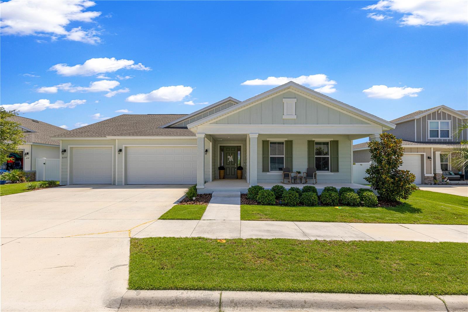 EXPERIENCE THE PERFECT BLEND OF LUXURY, COMFORT, AND LIFESTYLE IN THIS BEAUTIFULLY DESIGNED ACACIA MODEL LOCATED IN THE HIGHLY SOUGHT-AFTER MASTER-PLANNED COMMUNITY OF CALESA TOWNSHIP. OFFERING 4 BEDROOMS, 3 FULL BATHS, A FLEX ROOM, AND A SPACIOUS 3-CAR GARAGE, THIS THOUGHTFULLY DESIGNED HOME PROVIDES ROOM FOR EVERYONE. STEP INSIDE TO DISCOVER HIGH CEILINGS, BEAUTIFUL TILE FLOORING THROUGHOUT THE MAIN LIVING AREAS, AND AN OPEN-CONCEPT DESIGN FILLED WITH NATURAL LIGHT AND A BEAUTIFUL LARGE ENTRY.  THE GOURMET KITCHEN IS THE HEART OF THE HOME, FEATURING QUARTZ COUNTERTOPS, BUILT-IN OVEN AND MICROWAVE, A LARGE CENTER ISLAND WITH SINK AND DISHWASHER, STYLISH PENDANT LIGHTING, AND ABUNDANT CABINETRY, ALL OVERLOOKING THE EXPANSIVE LIVING ROOM—PERFECT FOR ENTERTAINING FAMILY AND FRIENDS. THE VERSATILE FLEX ROOM IS IDEAL AS A HOME OFFICE, PLAYROOM, MEDIA ROOM, FORMAL DINING SPACE OR FITNESS ROOM. THE BARN DOOR ENTRY WILL GIVE YOU ALL THE PRIVACY YOU'D NEED TO ENJOY THIS SPACE. YOU'LL ALSO APPRECIATE THE CONVENIENT INSIDE LAUNDRY ROOM WITH A DEDICATED FOLDING AREA AND EXTRA CABINETRY, ALONG WITH A SEPARATE OFFICE NOOK (NEST AREA) THAT'S PERFECT FOR WORKING FROM HOME OR MANAGING EVERYDAY TASKS. POCKET SLIDING GLASS DOORS OPEN TO A SPACIOUS COVERED L-SHAPED LANAI, CREATING SEAMLESS INDOOR-OUTDOOR LIVING. ENJOY THE PRIVACY OF NO REAR NEIGHBORS, MAKING THIS THE PERFECT PLACE TO RELAX OR ENTERTAIN. LIVING IN CALESA TOWNSHIP MEANS ENJOYING AN EXCEPTIONAL RESORT-STYLE LIFESTYLE WITH NEIGHBORHOOD POOLS, ROAN HILLS PARK, PLAYGROUNDS, DOG PARKS, BASKETBALL COURTS, MILES OF WALKING AND BIKING TRAILS, ELECTRONICALLY GATED NEIGHBORHOOD ENTRANCES, AND RESIDENT MEMBERSHIPS TO THE FAST (FLORIDA AQUATICS SWIMMING & TRAINING) CENTER. THE COMMUNITY ALSO FEATURES THE INA A. COLEN ACADEMY CHARTER SCHOOL AND IS CONVENIENTLY LOCATED NEAR SHOPPING, DINING, MEDICAL FACILITIES, AND MAJOR ROADWAYS.