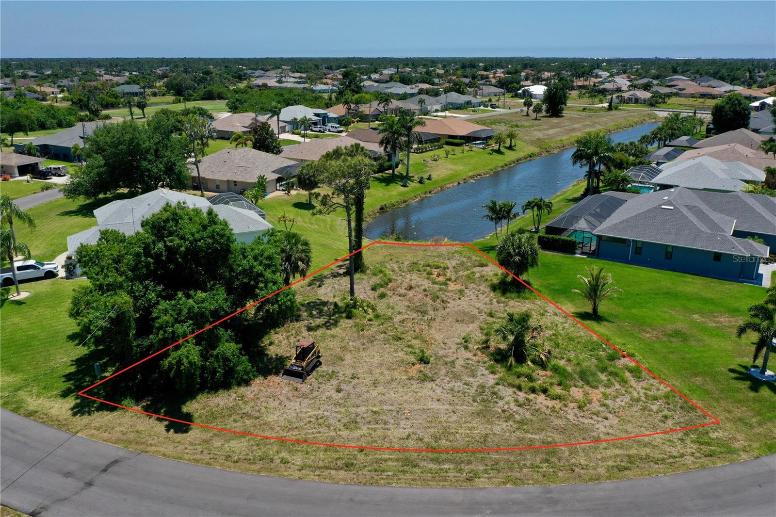 Build your dream home on this exceptional 10,000-square-foot freshwater canalfront lot located in the highly desirable White Marsh area of Rotonda West. This unique 0.23-acre parcel is situated on a graceful turn in the road, offering an impressive 121 feet of road frontage and a depth of 125 feet. Positioned at the end of the canal, the property provides 35 feet of water frontage with a stunning, long-range view directly down the waterway. Golf enthusiasts will find themselves in paradise, as this lot is nestled within the White Marsh Golf Course, with four additional courses located right within the same deed-restricted community.

The location offers the perfect balance of secluded tranquility and convenient access to Florida’s best amenities. You are approximately 30 minutes from I-75, making travel throughout the state a breeze. When you aren't on the greens, you can enjoy world-class sunrises and recreation at Englewood Beach or the beautiful shores of Boca Grande, both reachable within a short 15 to 20-minute drive. The surrounding area is rich with shopping and dining options in South Englewood and Port Charlotte, while sports fans will appreciate being just minutes away from the Tampa Bay Rays spring training facility. Whether you are looking to retire in a premier golfing community or seeking a prime investment in a growing area, this canalfront gem offers the ideal canvas for your Florida lifestyle.