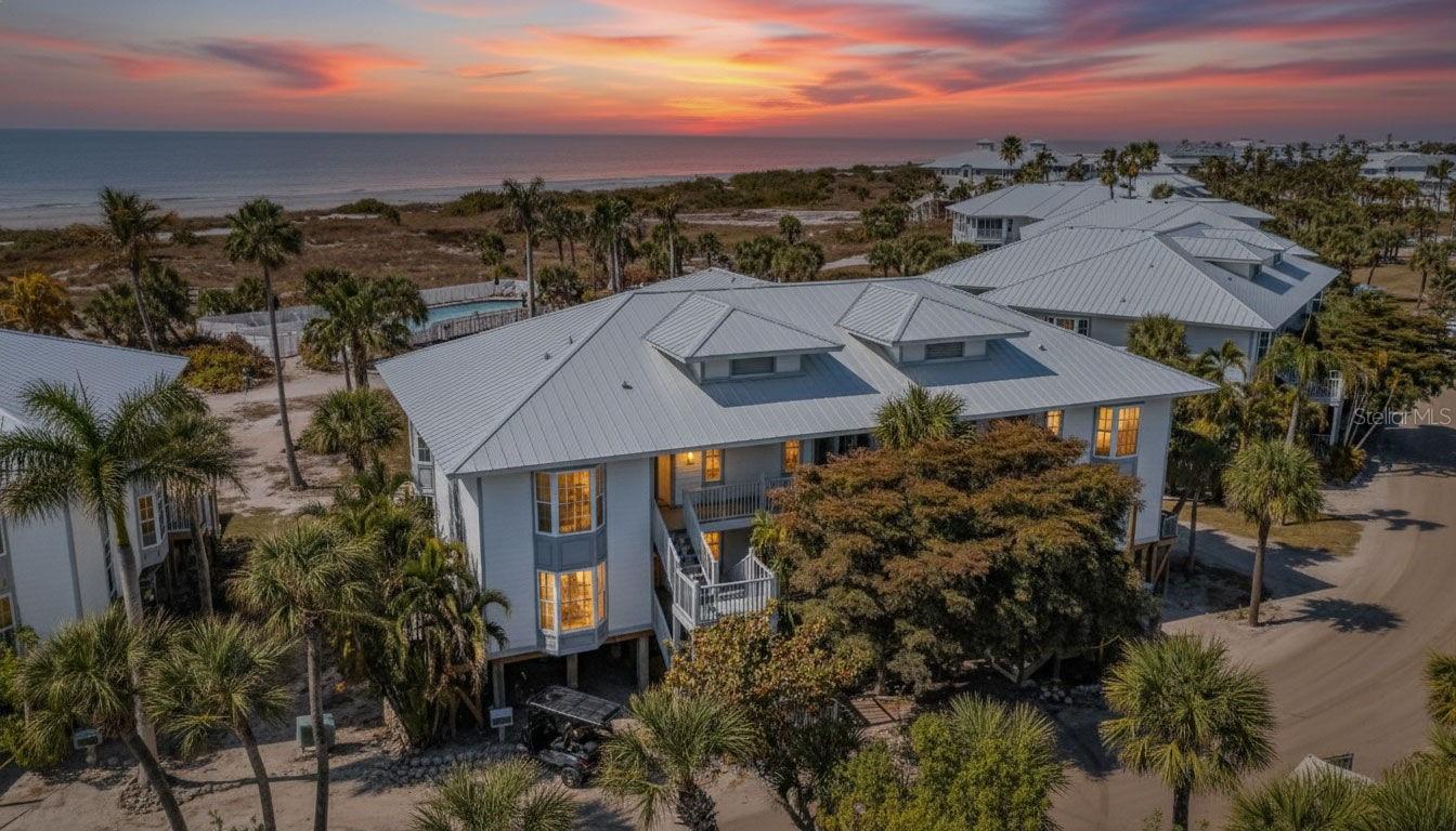 Own a slice of Gulf-front paradise at Palm Island Resort with this fully furnished, completely renovated beachfront and pool-front one-bedroom, one-bathroom condo offering direct access to sugar-sand shores and resort-style amenities.

This turnkey residence features a private balcony with direct stair access, placing you just steps from the beach and heated community pool. Inside, every detail has been thoughtfully upgraded for modern coastal living:

Luxury new flooring throughout, updated lighting and designer finishes, renovated bathroom with elegant tilework and quartz countertops, newer appliances and A/C& Hot Water Heater, all impact-rated windows and sliding doors with Hurricane-rated front door protection.

The open layout maximizes space and natural light, while the sleeper sofa expands accommodations—ideal for hosting guests or enhancing short-term rental income potential. Whether you’re seeking a low-maintenance beachfront getaway, an investment property, or both, this property delivers flexibility and strong appeal in today’s coastal market. Located within the desirable Beach Villas community, a part of Palm Island Resort, owners and guests enjoy: Heated pool and spa, private tennis & pickleball courts, two grilling areas, dual beach boardwalks, on-site dining at Rum Bay Restaurant, coffee, breakfast, and essentials at Coconuts Sundry Shop, a fitness center and activities clubhouse (accessible by golf cart, bike, or short walk), with golf cart, kayak, and bike rentals on site & available dockage for boating enthusiasts along with nature trails and organized activities to learn more, a bell service/concierge service and gated resort security. Beachfront inventory in Southwest Florida is limited—and renovated, furnished, income-ready units with this level of access are even more rare. If Gulf views, private beach access, and resort-style amenities are on your wish list, this is an opportunity worth securing. Schedule your private showing and experience island living at its finest.