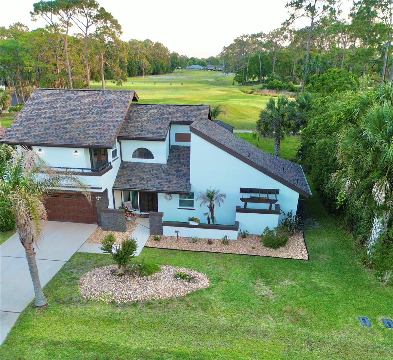 Welcome to your private resort-style retreat in the highly sought-after W Section of Palm Coast—perfectly positioned on the 18th green of Pine Lakes Golf Club with sweeping golf course and pond views, no HOA, and no rear neighbors.

The designer-inspired renovations in this 4-bedroom, 2.5-bath home offer the perfect blend of luxury and comfort. Every detail has been thoughtfully updated for modern living, creating exceptional indoor-outdoor flow and breathtaking views. For your peace of mind, major upgrades have also been completed, including a new roof (2023), all new windows and doors (2025), and durable Rhino Shield exterior coating with a 25-year transferable warranty (2025). Fiber optic internet is also available.

Step outside to your own backyard oasis with a heated saltwater pool, expansive outdoor living space with gorgeous views of the green and pond, and a rare oversized .32-acre homesite—ideal for entertaining or simply enjoying the Florida lifestyle.  

Properties offering this combination of golf course frontage, privacy, huge pool, oversized lot with mature trees, and beautiful renovations rarely become available at this price point.

Don't miss this fabulous opportunity in one of Palm Coast’s most desirable golf course communities; close to the freeway, shopping and Flagler County's gorgeous beaches.