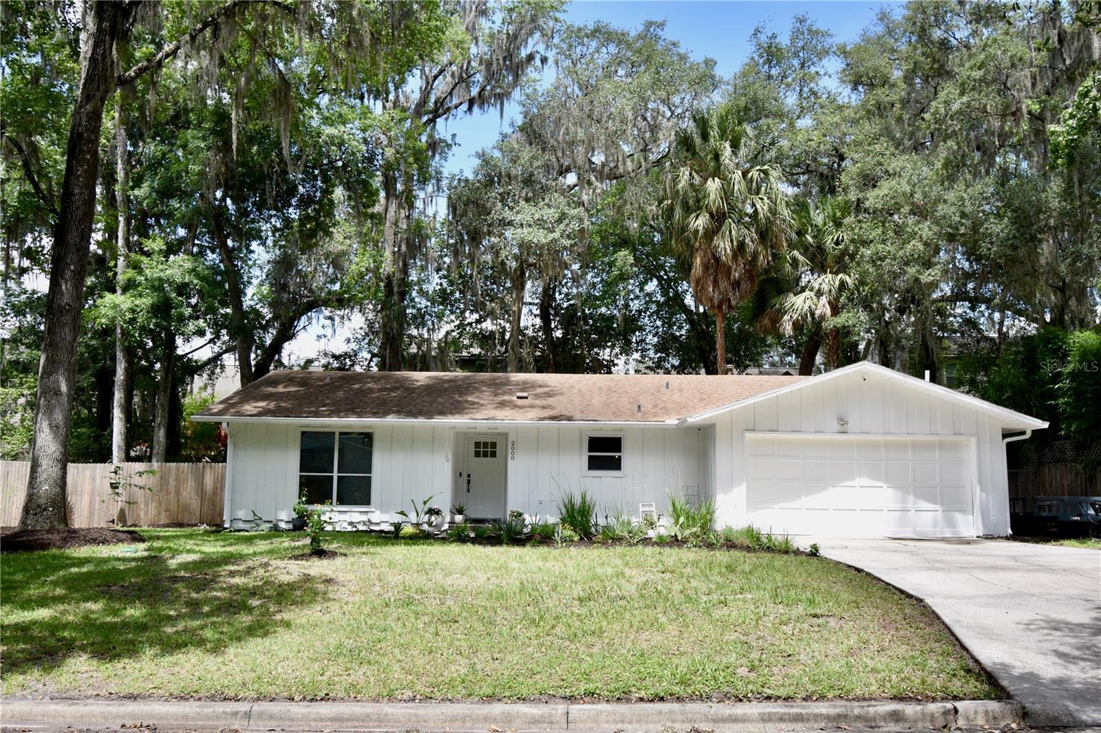 3/2 Concrete Block Home with 2-Car Garage | No HOA | Walk to Shands

This 3-bedroom, 2-bathroom concrete block home offers 1,390 sq ft of fully updated living space with a 2-car garage and no HOA. Located within walking distance of Shands Hospital and UF Health (no need to pay for parking!).

The home has been completely renovated throughout, including new luxury vinyl plank flooring, fresh interior and exterior paint, new baseboards, new interior doors, and fully remodeled bathrooms. The updated kitchen features stainless steel appliances, butcher block countertops, and an indoor washer and dryer. Roof replaced in 2019.

Additional features include a screened-in back porch and a fully fenced yard. Move-in ready.