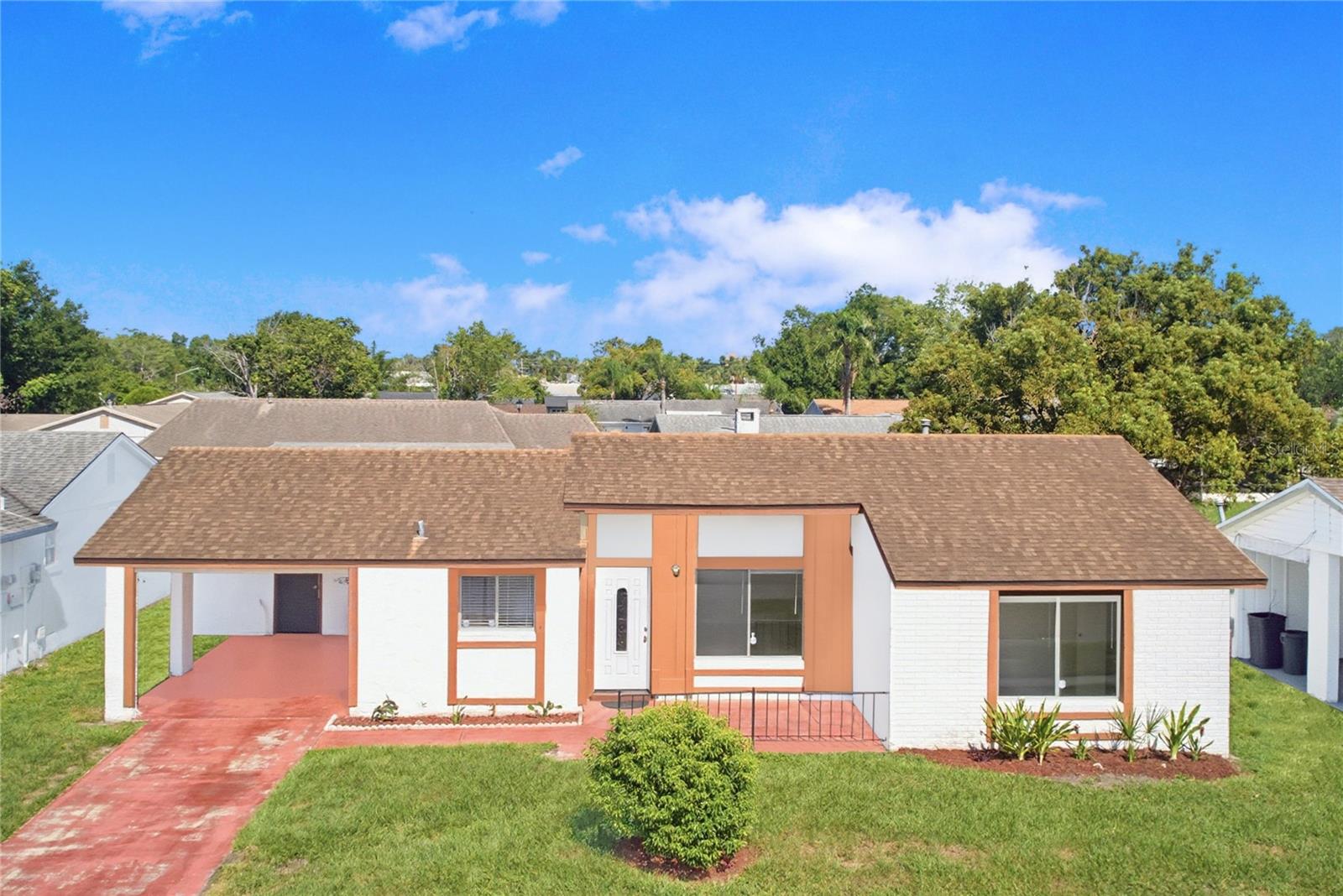 Virtually Staged. Welcome home to this spacious 1,797-square-foot, 2-bedroom, 2-bathroom residence in the Williamsburg community — complete with a nearly new AC system installed in 2025! Buyers who use the Seller's preferred lender and go under contract by 8/31/2026 may receive up to 1% toward closing costs (terms and conditions apply).
This home boasts a bright, open floor plan with no carpet throughout, making maintenance effortless. Two generous living areas provide wonderful flexibility — perfect for entertaining, a home office, or a dedicated hobby or media room. Large windows fill the space with natural light, creating a warm and welcoming atmosphere throughout.
Both bathrooms have been beautifully renovated. The primary bath features an elegant backsplash for a refined, spa-like feel, while the second full bathroom has been completely upgraded with a new sink and a walk-in shower featuring a spa rain showerhead.
Additional updates offer extra value and peace of mind, including a new microwave. Outside, fresh landscaping boosts curb appeal, and the enclosed rear screened porch provides a relaxing retreat year-round. Inside, a cozy fireplace adds warmth and character to the living space.
A low monthly HOA fee grants access to a multi-functional clubhouse, a state-of-the-art fitness center, and a resort-style pool, and includes front and rear lawn care. Green Briar's HOA hosts numerous community events throughout the year, offering residents plenty of opportunities to connect and get involved.
Ideally located with quick access to SR-528 (Beachline Expressway) and I-4, this home is just minutes from Orlando's top attractions, shopping, dining, outlet malls, hotels, and entertainment along the International Drive corridor.
Schedule your private showing today!