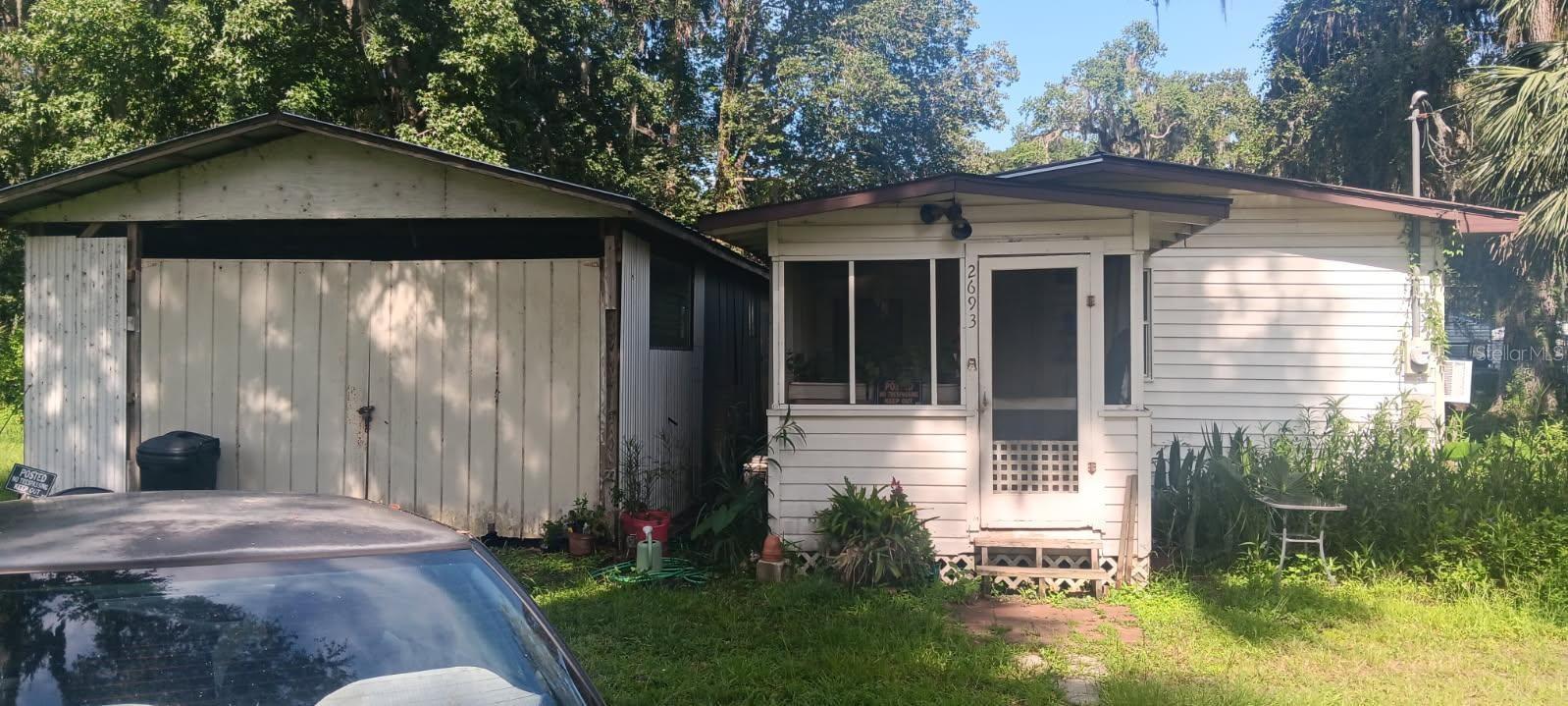 This is a great starter home!  So many opportunities here!  Don't miss out on this little gem!  Two bedrooms and one bath just blocks from the lake. There is a beautiful garden area in the back of the home.  Lake Panasoffkee is known for it's great fishing.