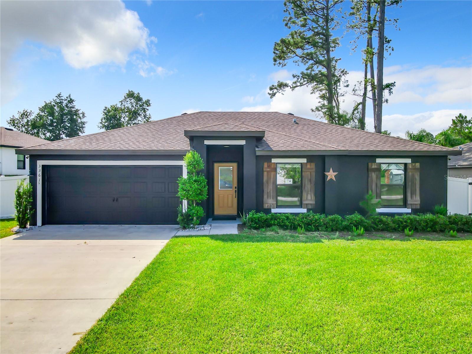 Welcome to your exquisite dream home in Deltona Lakes! Nestled within the picturesque community of Deltona, this stunning 3-bedroom, 2-bathroom residence boasts an attached 2-car garage and is now available for sale. Elegantly designed by LGI Homes, the breathtaking Vero plan is a single-story masterpiece that seamlessly blends comfort with functionality. Step inside and discover an inviting open floor plan that harmoniously accommodates both relaxation and entertainment. With 3 spacious bedrooms and 2 full baths, this home offers unparalleled comfort and convenience. The family/dining room combination is a delightful space, while the kitchen is thoughtfully designed with an eat-in breakfast nook, creating the perfect setting for mornings bathed in sunlight. Quality and elegance converge as the home features energy-efficient appliances, generous countertops, and stylish brushed nickel hardware. The intelligent split bedroom layout positions Bedrooms 2 and 3 with generous proportions, sharing a well-appointed bathroom. Meanwhile, your master bedroom, strategically located overlooking the backyard, is privately situated off the family room. It offers a full bathroom and walk-in closet, granting homeowners the desired amount of seclusion. Stepping outside, you'll find a paved patio with a charming gazebo that promises delightful gatherings and weekend barbecues and invites you to indulge in the beauty of nature. The huge backyard providing tons space for outdoor activities, gardening, and endless possibilities. This residence also includes a convenient shed in the backyard, ensuring ample storage space. This home comes equipped with a security camera system, including a control panel and 1TB DVR. Conveniently situated in a prime location with effortless access to parks, conservation areas, and world-renowned beaches, this home harmoniously balances education, convenience, and leisure. Schools, shopping centers, and restaurants are mere minutes away, and the proximity to Halifax Hospital and Downtown Deland adds to the allure of this location. For those seeking connectivity, this locale ensures swift access to major routes such as I-4, US-17, and 417. A brief commute leads to recreational destinations like Dewey O Boster Sports Complex, Saxon Park & Ride, AdventHealth Fish Memorial, and the Central Florida Zoo & Botanical Garden. The neighboring cities of Deland, Sanford, and Lake Mary provide a tapestry of attractions, including local culinary delights and boutique shopping. With the added advantage of NO HOA, this residence on Utah Drive stands as an excellent choice for first-time homeowners or astute investors. Welcome home to a life of comfort, convenience, and limitless possibilities!