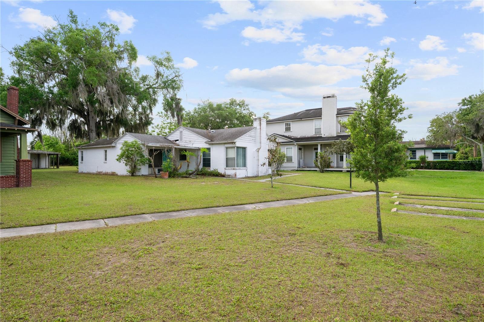 Own a piece of Lake Killarney, a rare opportunity to build your dream water view estate in the heart of Winter Park. This exceptional homesite offers direct access to private, spring-fed, skiable Lake Killarney, complete with water rights and the ability to build your own private dock. An increasingly rare opportunity in one of Central Florida's most desirable communities.
Ideally located just minutes from Park Avenue, Winter Park Village, Rollins College, and Downtown Orlando, you'll enjoy the perfect balance of lake life, tranquility and walkable convenience. Experience award-winning dining, boutique shopping, entertainment, cultural attractions, and everyday conveniences just moments from your future home.
Priced to encourage redevelopment, this property is adjacent to 230 Killarney Drive, creating a rare opportunity to purchase one or both parcels. Together, they form an extraordinary double-lot assemblage with expansive views of Lake Killarney and endless possibilities to design a landmark residence.
Whether purchased individually or together, opportunities to own on Lake Killarney are exceptionally limited. Build the custom home you've envisioned while enjoying one of Winter Park's most coveted locations from this desirable homesite with private lake access and the ability to build your own dock.