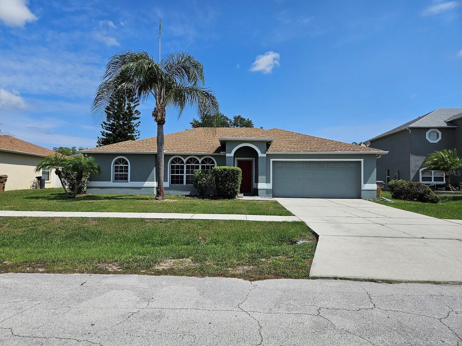 Space galore! This home offers 4 bedrooms 3 full bathrooms. The home features two master bedrooms with full bathrooms.   A split bedroom floor plan design with separate dining room area, and a formal living room area. With over 1850 htd sq/ft of living area makes this home perfect for that large family demanding more space. A large double car garage brings the total Sq/ft to over 2700. Situated on a cul de sac with a large back yard that is completely fenced for privacy. Features a large covered lanai for great outdoor entertaining.  Convenient to shopping and schools. Must See Home. All room sizes are approximate and must be independently verified.