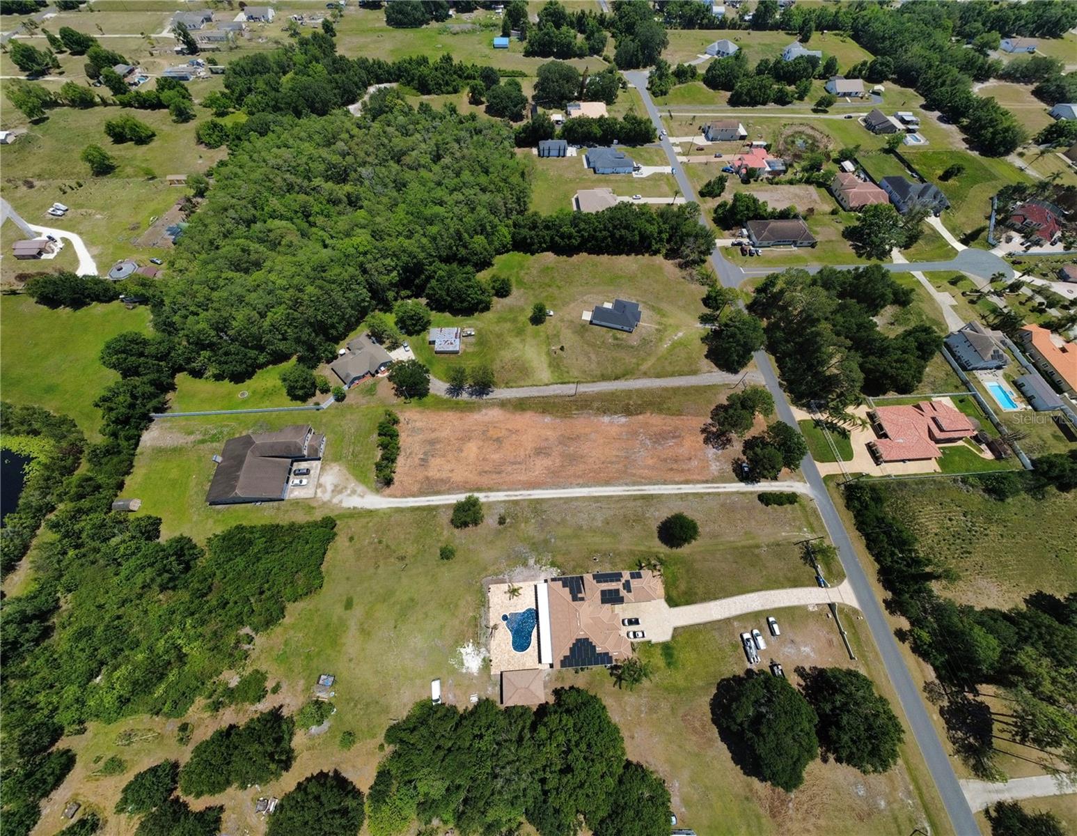 Build-ready and full of potential, this prime vacant land opportunity in Kissimmee is nearly construction-ready with approximately 95% of site work already completed. The lot has just been cleared, saving you significant time and upfront costs—making it the perfect canvas for your custom homebuilder to bring your vision to life.

Positioned in a rapidly growing area, this property offers both convenience and lifestyle appeal. Enjoy being just a short drive from world-famous theme parks, major attractions, and exciting sporting events. You’ll also have easy access to the renowned rodeos and year-round events hosted by KVLS, adding a unique local charm and entertainment value that few locations can match.

For residential investors, this property checks every box—strong location demand, development-ready condition, and proximity to Central Florida’s top destinations. Whether you’re looking to build a primary residence, vacation home, or investment property, this is a rare opportunity to step into a nearly turnkey land project in one of Florida’s most sought-after markets.

Don’t miss your chance to secure a ready-to-build homesite in the heart of it all.