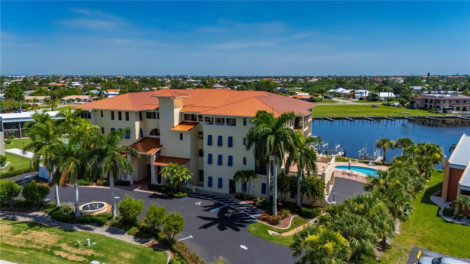 Luxury Waterfront Living with Direct Sailboat Access! Welcome to Outlook Cove Condominiums, where elegance and the Southwest Florida boating lifestyle come together. This beautifully maintained garden-level 3-bedroom + den, 2-bath residence offers direct, no-bridge sailboat access to Charlotte Harbor through the newly completed Buckley Pass, allowing you to reach open water in approximately 20 minutes. Your private dock is equipped with a 6,000-lb boat lift, making it ideal for avid boaters.
Inside, you'll find a spacious open floor plan featuring tile flooring throughout, soaring 10-foot ceilings, and abundant natural light. The well-appointed kitchen boasts granite countertops, 42-inch wood cabinetry, stainless steel appliances, a large center island, and a reverse osmosis water filtration system serving the kitchen sink and refrigerator ice maker.
Additional upgrades include impact-resistant windows, elevator access, ceiling fans, two assigned under-building parking spaces, and a private storage unit. Ideally located close to shopping, dining, downtown Punta Gorda, medical facilities, and Punta Gorda Airport, this exceptional waterfront residence offers the perfect blend of luxury, convenience, and Florida coastal living. Schedule your private showing today!