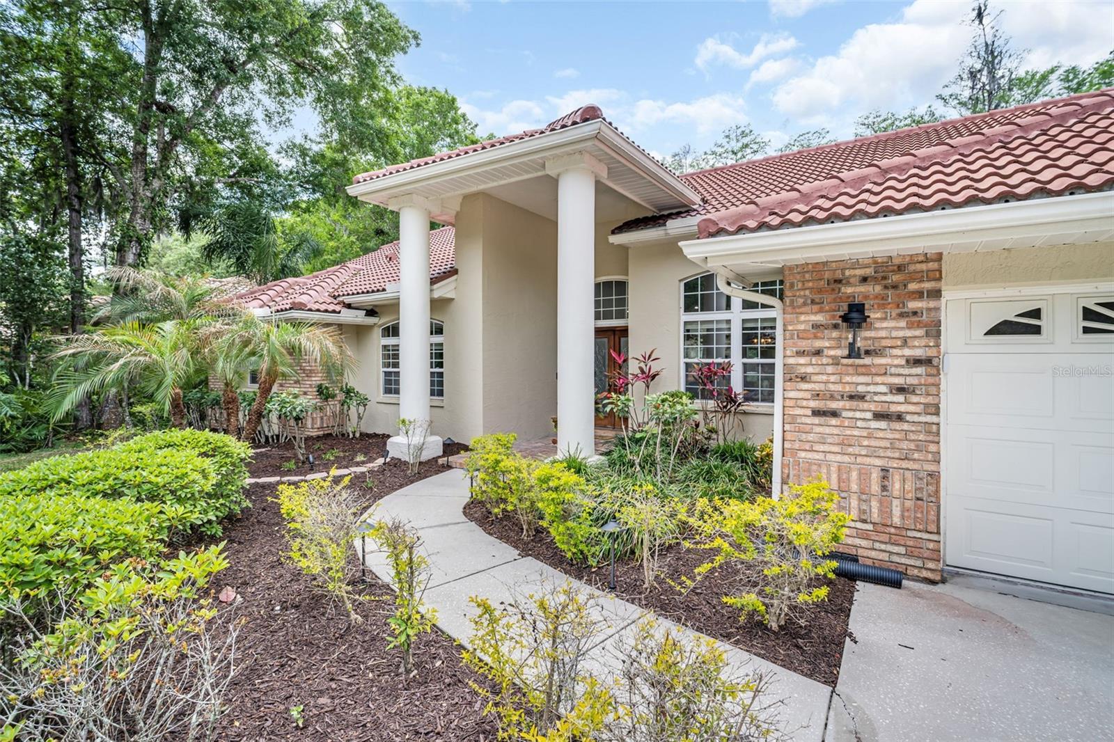Located in the highly desirable gated community of East Lake Woodlands, this spacious 4 bedroom, 3 bathroom home offers a versatile layout with 2 bonus rooms and a dedicated office. One of the bonus rooms is located upstairs, providing added flexibility for multi-use living. Pool table will convey with the sale. The home features a solar-heated in-ground pool with a large pool deck, fully enclosed by a screened lanai, creating the perfect space for year-round Florida living and entertaining. The inviting living room includes a fireplace, adding warmth and character to the main living area.
The kitchen is well-appointed with abundant wood cabinetry, generous storage, and a center island ideal for cooking and gathering. The split-bedroom floor plan provides privacy, with the primary suite featuring sliding glass doors to the pool, a walk-in closet, and an en-suite bath with dual vanities, a bathtub, and a separate shower.
Additional highlights include a 2-car garage, a laundry room, and exceptional interior space throughout. A unique third garage bay has been converted into an interior room, offering even more flexible living options.
Residents of East Lake Woodlands enjoy resort-style amenities including a clubhouse, golf courses, country club, heated pools, tennis and pickleball courts, fitness center, dining options, and scenic walking and biking paths within a secure gated community.
Conveniently located in Oldsmar, this home provides easy access to Gulf beaches, Tampa International Airport, top-rated schools, dining, and shopping, offering the best of the Tampa Bay lifestyle.