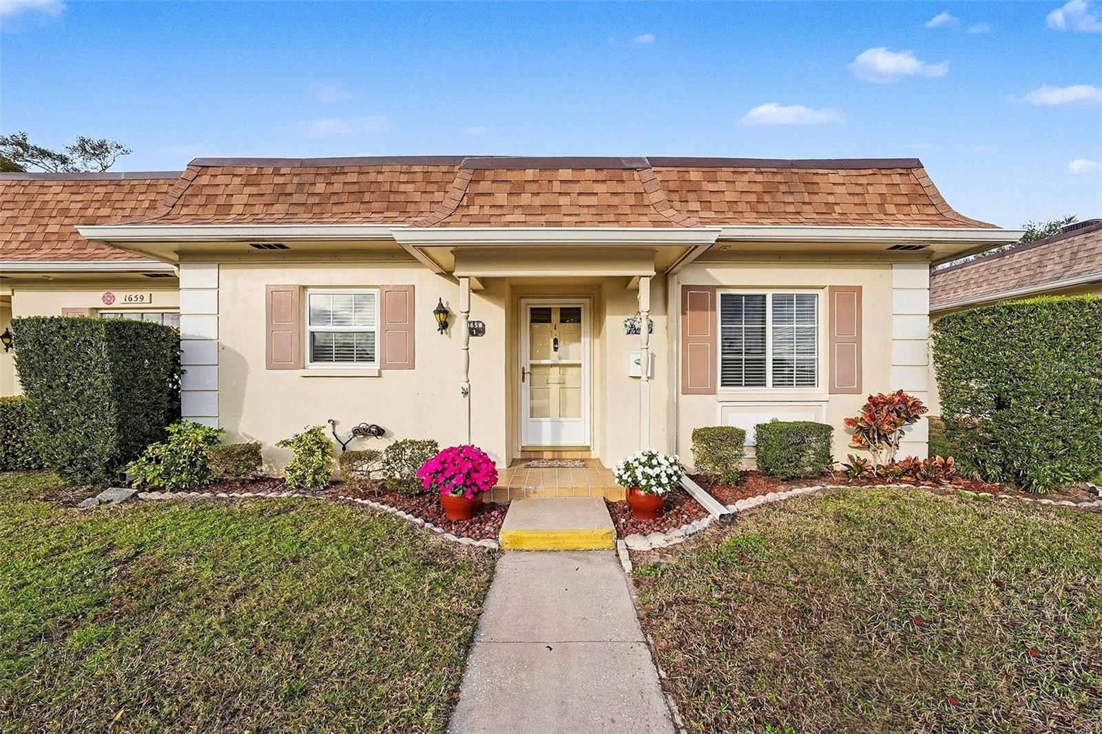 Virtually Staged. Sellers are motivated and ready to make a deal!  This move in ready 2-bedroom, 2-bath villas located in the desirable, 55+ Normandy Park Villa Community.  This sought-after corner unit has been beautifully remodeled all within the last five years.  Offering 1527 square feet of spacious living with modern updates, quality finishes, and total peace of mind.

The stylish kitchen was updated between 2020-2023 with new appliances, quartz countertops, custom cabinetry, a tile backsplash, ceramic wood-look flooring and a custom-build breakfast nook. Luxury vinyl plank and ceramic tile flooring run throughout the home - no carpet to maintain. 

Interior updates include fresh paint, updated lighting and ceiling fans, new bathroom vanities and mirrors, updated electrical outlets, and 6-panel bifold doors.  A custom closet by Design Shelving features a window seat that adds both function and charm.  Enjoy your morning coffee on your private rear patio.

The community offers a heated pool and a large clubhouse, a library, card room, an exercise room with a pool table. Fun activates like coffee hour, bunco, bingo, chair volleyball, water aerobics, poker night,  rummage sale yearly, and so much more. Conveniently located just steps from Eagle Lake Community Park, and Le Belle Shopping Plaza with restaurants, salons, a pet store and a UPS store.  Close to area beaches and with easy reach to both St. Petersburg Clearwater International Airport and Tampa Internation Airport.