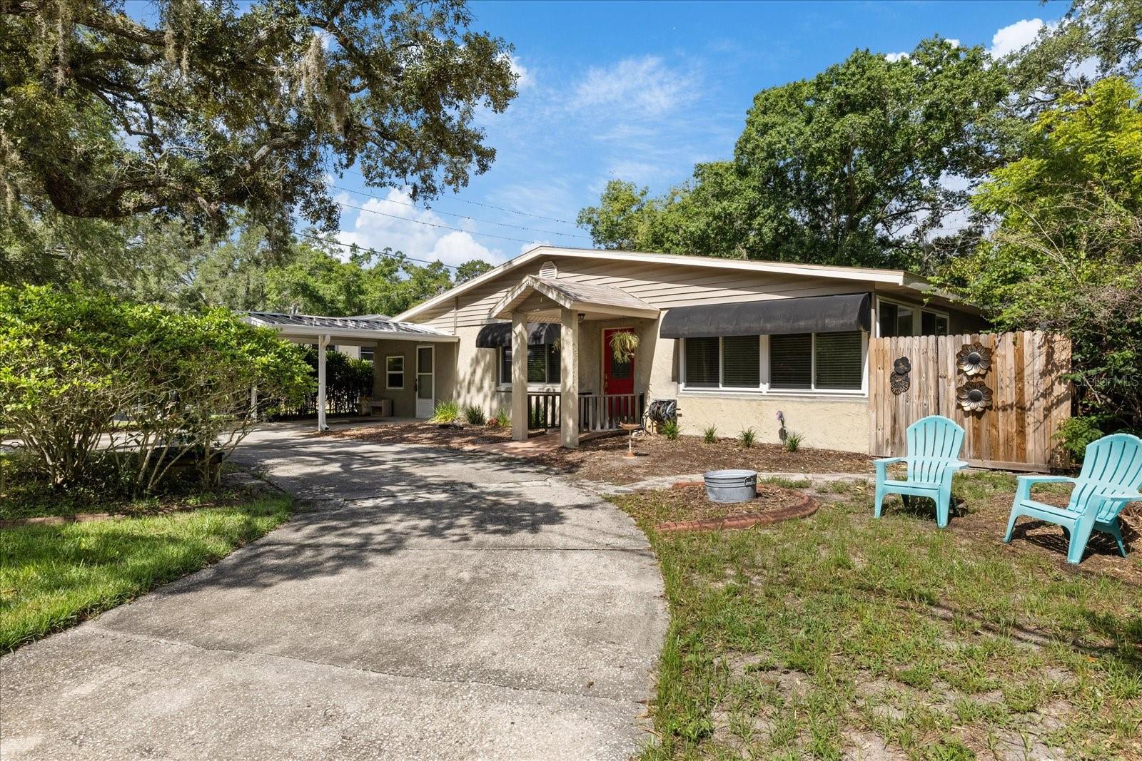 Welcome to 12510 Noreast Dr, Tampa, FL—an exceptional opportunity to own one of North Tampa's BEST VALUES, where timeless Florida charm, unbeatable flexibility, and true financial FREEDOM come together! Nestled on a PRIVATE OVERSIZED FULLY FENCED LOT in the highly sought-after Forest Hills GOLF COMMUNITY, this solid block Florida ranch offers NO HOA, NO CDD, NO lease restrictions, and FLOOD ZONE X (NO FLOOD INSURANCE REQUIRED), making it an incredible choice for homeowners and investors alike. Inside, you'll find 3 bedrooms, 2 bathrooms, and 2 BONUS ROOMS; a bright Florida Room perfect for a home office, formal dining room, or flex space, plus an enormous BONUS FAMILY ROOM WITH ITS OWN PRIVATE ENTRANCE—ideal for a guest suite, in-law retreat, game room, home business, or ultimate man cave, highlighted by a stunning original stone accent wall. The home also features beautiful terrazzo and porcelain tile flooring, solid wood cabinetry, all kitchen appliances plus WASHER AND DRYER, a spacious INDOOR LAUNDRY ROOM, covered carport, screened rear porch, storage shed, and an expansive backyard built for unforgettable family gatherings, entertaining, or the garden you've always dreamed of. Beyond the property, Forest Hills delivers a lifestyle few neighborhoods can match with the renowned Babe Zaharias 18-HOLE GOLF COURSE, CLUBHOUSE, restaurant & grill, pro shop, practice facilities, golf leagues, lessons, junior programs, holiday events, and a true sense of community surrounded by mature oak trees. All of this is just minutes from Downtown Tampa, Busch Gardens, Tampa Zoo, major highways, shopping, dining, entertainment, Clearwater's world-famous beaches, and everything Tampa Bay has to offer. Opportunities like this—with this much space, flexibility, location, lifestyle, and long-term savings—rarely hit the market. This isn't just another home...it's one of the smartest buys available in Tampa today. ALL FINANCING TYPES ARE WELCOME—INCLUDING CASH, CONVENTIONAL, FHA, VA, AND DOWN PAYMENT ASSISTANCE—and the home is SOLD AS-IS-schedule your private showing immediately before someone else claims it!