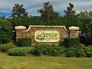 Beautiful cleared lot ln lux custom home community.
