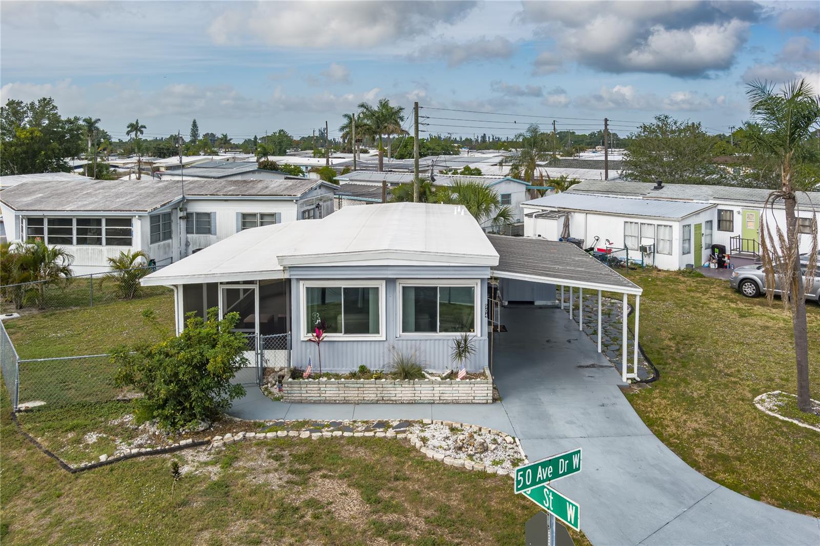Discover a move-in-ready, fully furnished home offering comfort and convenience in a welcoming 55+ community, perfect for those looking to escape colder climates and enjoy a relaxed lifestyle year-round or seasonally. This land-owned property (no lot lease) provides added value and flexibility, including rental opportunities and a pet-friendly setting with a fenced yard ideal for your furry companions. Situated on a desirable corner lot, the home features significant recent updates, including a brand-new roof installed in 2025, giving peace of mind to its next owner. With a low monthly HOA of just $130, this property combines affordability with ease of living. Its prime location near Sarasota–Bradenton International Airport, as well as a variety of shopping and dining options, makes it an exceptional choice for both convenience and lifestyle.