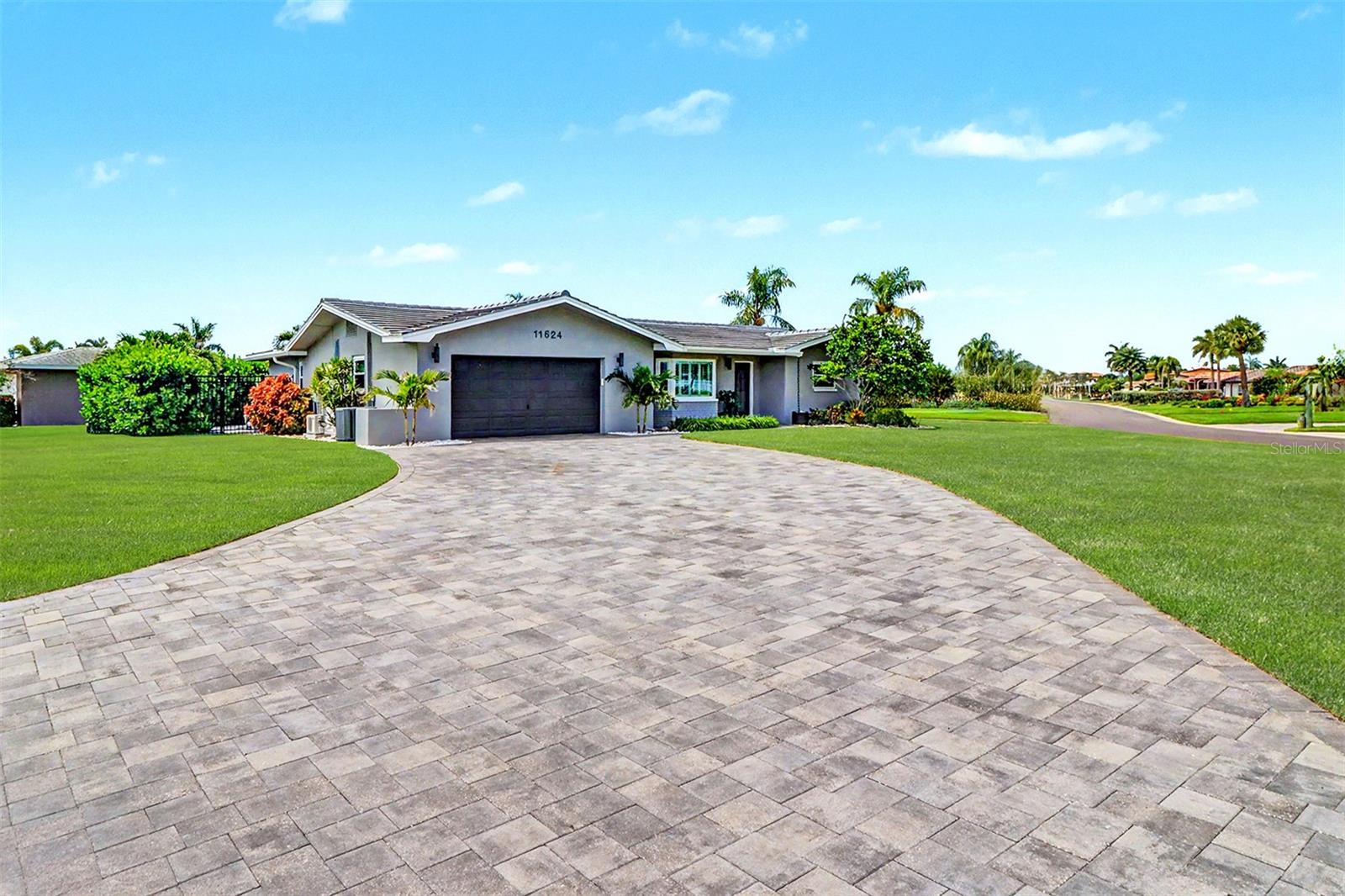Welcome to this beautifully updated 3-bedroom, 2-bathroom pool home with a 2-car garage located in desirable Oakhurst Shores, in the heart of Seminole . Thoughtfully upgraded throughout, this property combines modern convenience, energy-efficient systems, and resort-style outdoor living.

The home's exterior is highlighted by a newly installed tile roof (2025) and lush, irrigated landscaping supported by a new Pentair deep-water well pump, Rain Bird automated sprinkler system, and backyard drip irrigation system. Inside, you'll find a stylishly updated interior featuring all-new cabinetry in the kitchen and both bathrooms with soft-close drawers and cabinets, new closet storage systems (2025), and a fully remodeled kitchen complete with all-new appliances (2025) and a convenient mixer lift for easy KitchenAid storage and access.

Step outside to your private backyard oasis featuring a stunning saltwater pool and spillover hot tub added in 2022. The pool area is equipped with a Jandy Smart Pool System offering complete app-controlled functionality, along with a new Jandy pool pump (2025), new Jandy salt cell (2025), and Jandy pool/spa heater for year-round enjoyment. Motorized remote-controlled screens seamlessly open the covered lanai to the pool area, creating the perfect indoor-outdoor entertaining space. Relax while enjoying the installed Samsung 65-inch TV overlooking the pool deck.

Additional major improvements include a new Rheem Performance water heater (2025), upgraded electrical panel with additional breaker capacity, 50-amp RV hookup, and a dedicated 50-amp generator hookup that allows direct connection to the home's electrical system during power outages. The oversized 2.5-car garage is climate-controlled with a Cooper & Hunter mini-split A/C and heating system, providing a comfortable space for hobbies, storage, or a workshop.

Additional features include a Just Water whole-house water conditioning system and an updated Nest smart thermostat for efficient climate control.

With extensive recent upgrades, premium smart-home features, and an exceptional outdoor living experience, this move-in-ready Seminole home offers the perfect blend of comfort, convenience, and Florida lifestyle living.