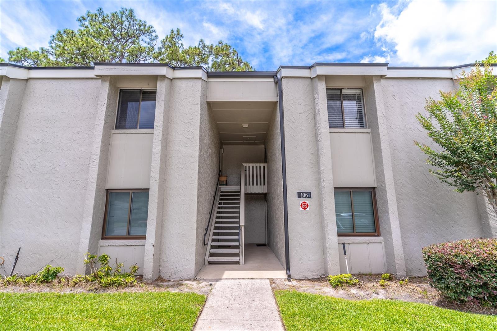 Virtually Staged. This darling condo is located in the Springwood community and offers wonderful natural light. The entry way flows right into the living room which provides sliding doors to the screened-in patio. The kitchen boasts granite counters, tile backsplash and eat-in area. The primary bedroom offers ample space. The primary and secondary bedroom share a hallway bathroom. The secondary bedroom is perfect for a guest room, office or craft room. The screened-in patio overlooks wonderful green space and includes a storage closet. This condo is close to many area restaurants and shops. Welcome Home!