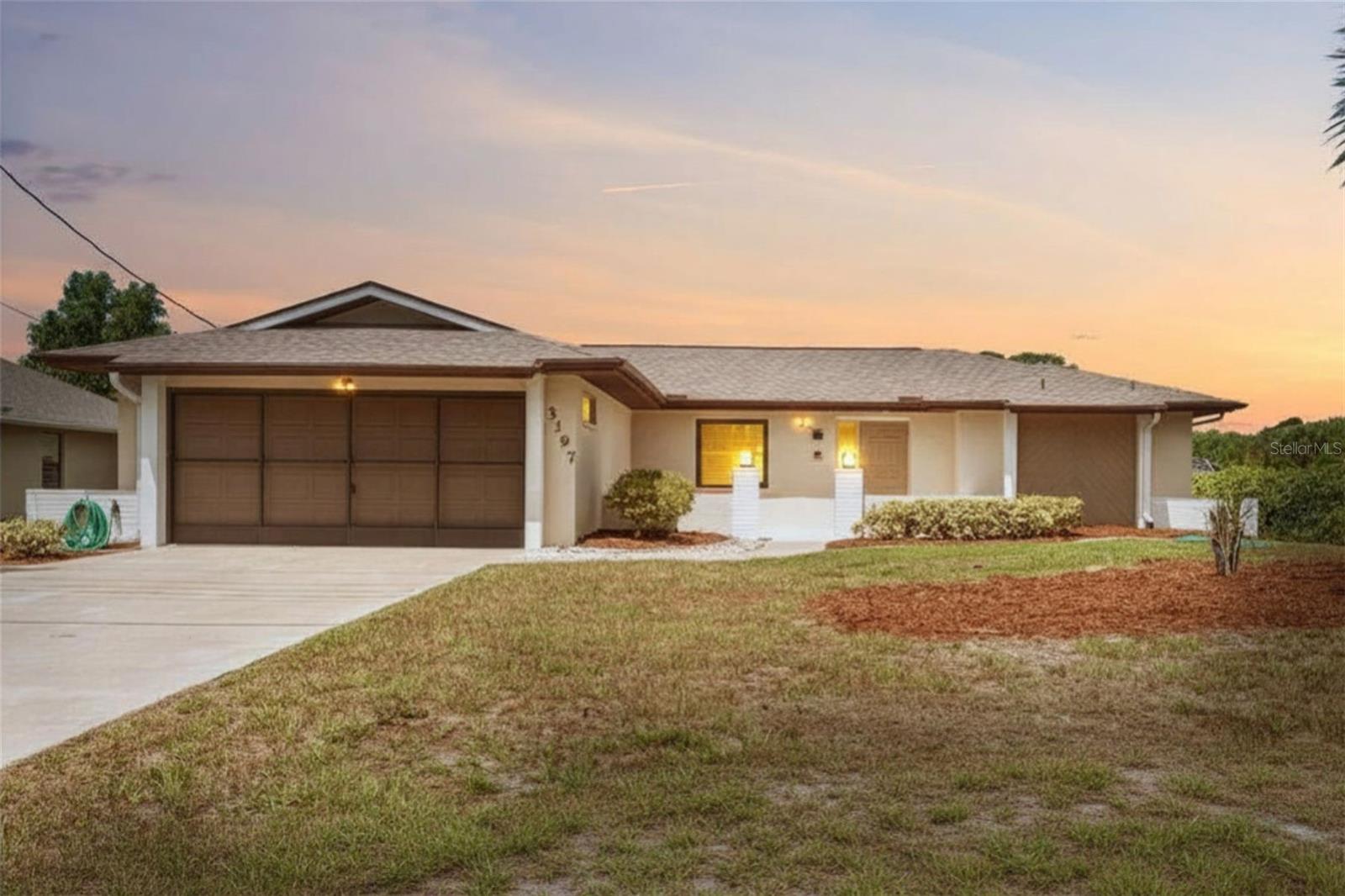 Welcome to your own slice of waterfront paradise with quick Gulf access, wide canal views, and everything a boater could want, including a boat lift. Spend your days on the water and your evenings unwinding on the expansive lanai, enjoying the pool and taking in breathtaking western exposure sunsets. From the moment you walk through the front door, your eyes are drawn straight to the outdoor living space through pocketing glass sliders, creating that seamless indoor outdoor Florida lifestyle buyers are looking for. Inside, this light filled home features volume ceilings with decorative beams in the great room and an updated kitchen with custom hardwood cabinetry, soft close drawers, granite countertops, a breakfast bar, and stainless-steel appliances. The spacious primary suite offers a sitting area with direct access to the pool, dual vanities, a walk-in shower, and generous his and hers walk-in closets. The guest bathroom provides convenient access from both the interior living space and the pool area, offering a functional layout similar to a Jack and Jill design. Major updates provide peace of mind, including a new roof in 2022, hurricane impact windows in 2020, roll down shutters on lanai, a pool heater in 2019, and a new septic in 2015. Conveniently located near shopping, dining, and medical facilities, this home combines comfort, style, and the best of Florida waterfront living.