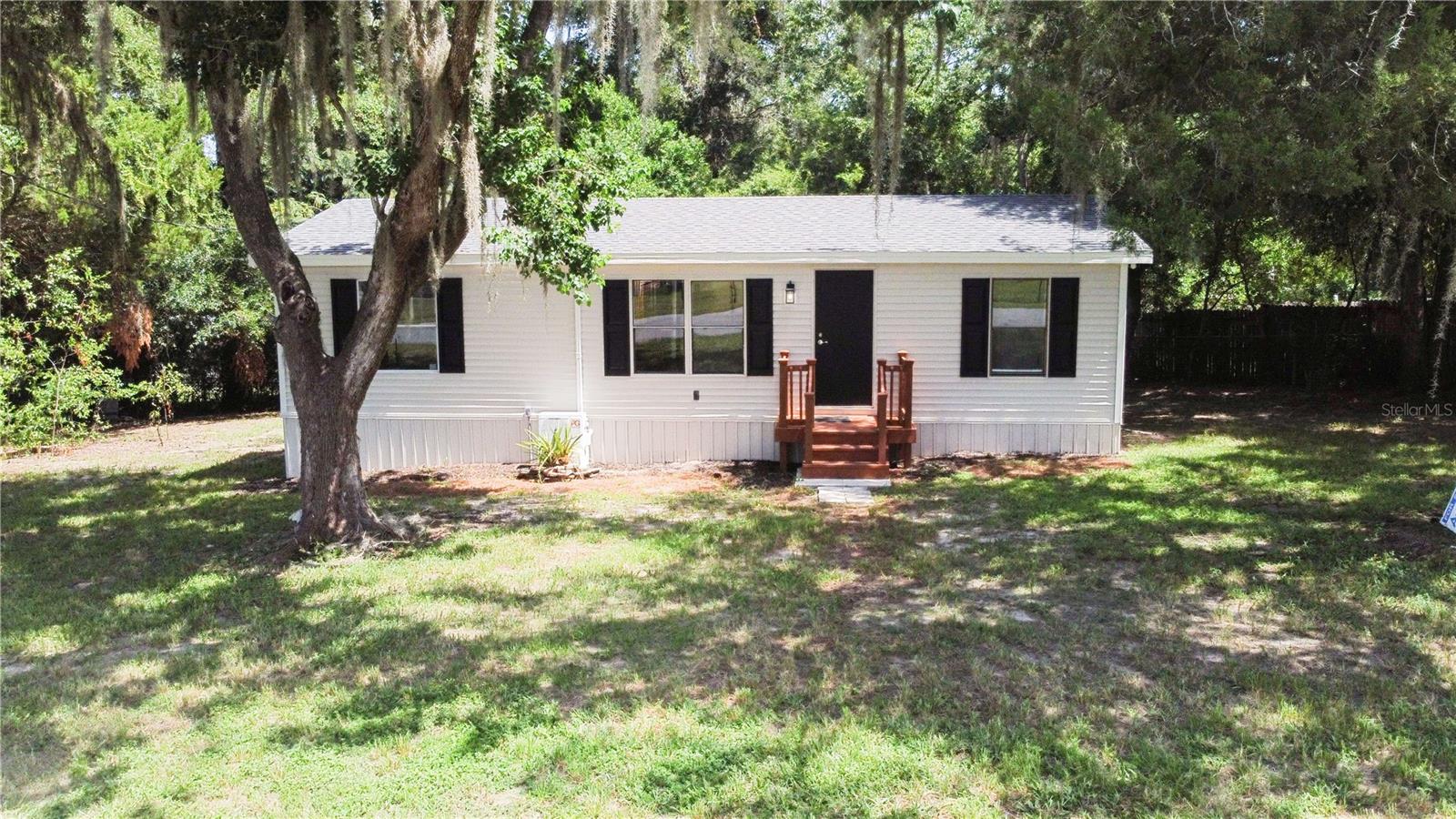 Looking for a move-in-ready home that offers both privacy and convenience? This beautifully remodeled 3-bedroom, 2-bath home is tucked away on a quiet paved road while still being just minutes from shopping, restaurants, and everything you need. Completely updated in 2026, you’ll enjoy peace of mind with a brand-new roof, new A/C system, luxury vinyl plank flooring throughout, and modern finishes in every room. The gorgeous kitchen features new cabinets, quartz countertops, and stainless steel appliances, while both bathrooms have been fully renovated with matching quartz countertops and updated vanities. Need extra space? The spacious 400-square-foot Florida room is perfect for a second living area, home office, playroom, gym, or hobby room. Whether you’re relaxing at home or entertaining family and friends, this home has the space and updates to fit your lifestyle. Schedule your showing today and come see everything this Floral City gem has to offer!