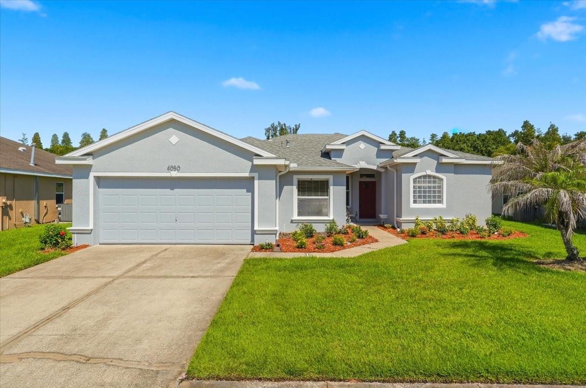 Experience peaceful waterfront living in the sought-after gated community of Carillon Lakes! This beautifully maintained 3-bedroom, 2-bath home offers a desirable split-bedroom floor plan designed for both comfortable everyday living and effortless entertaining. From the moment you enter, you’ll appreciate the spacious living area, formal dining room, and abundant natural light throughout.

The private primary suite is a relaxing retreat featuring walk-in closets, direct access to the screened lanai, and an ensuite bath with dual vanities, a soaking garden tub, and a separate shower. Two generously sized guest bedrooms are tucked away on the opposite side of the home, providing privacy for family or visitors.

The well-appointed kitchen offers ample cabinetry, plenty of countertop space, and a cozy breakfast nook overlooking the living areas. Step outside to the screened lanai and unwind while taking in tranquil water views with no rear neighbors—an ideal setting for morning coffee, evening sunsets, or entertaining friends.

This home has been thoughtfully updated with major improvements, including a new roof (2020), energy-efficient windows (2021), HVAC system (2021), water heater (2022), and a complete re-plumb in 2025, providing added value and peace of mind for years to come.

Carillon Lakes offers an exceptional lifestyle with resort-style amenities including a community pool, fitness center, tennis and pickleball courts, basketball court, playground, fishing lakes, scenic walking trails, and picnic areas. The HOA also includes lawn maintenance, basic cable and internet, maintenance of common areas, and the security of a 24-hour guard-gated entrance.

Conveniently located just minutes from the Polk Parkway, I-4, Lakeland Linder International Airport, shopping, restaurants, and medical facilities, this home combines comfort, convenience, and an unbeatable community setting. Don’t miss this opportunity to own a beautifully maintained waterfront home in one of Lakeland’s most desirable gated communities. Schedule your private showing today!
