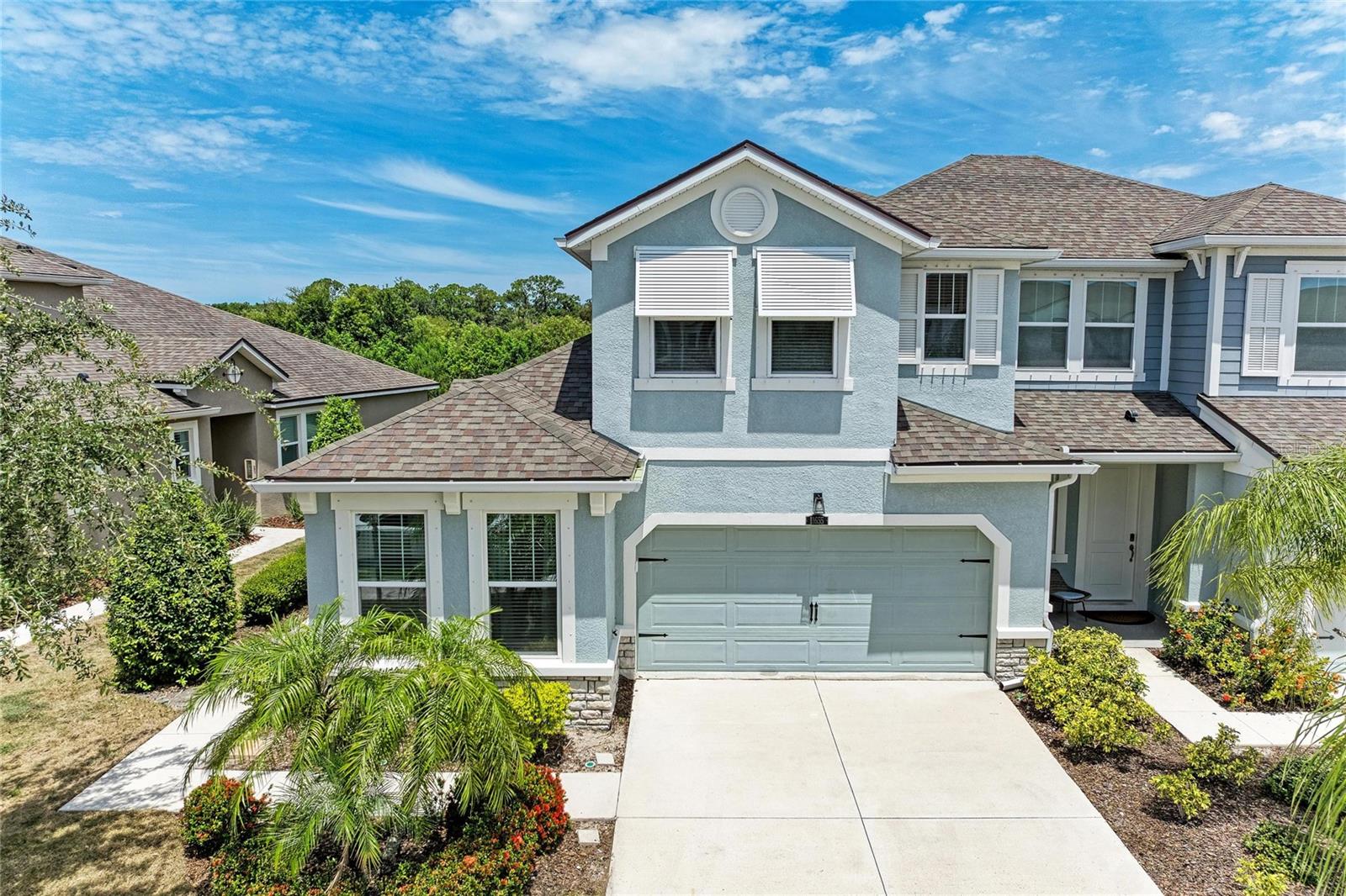 Welcome to Harmony at Lakewood Ranch, where comfort, convenience, and community come together. This 3-bedroom, 3 full bath, end-unit townhome offers 1,728 square feet of thoughtfully designed living space and a floor plan that provides both flexibility and functionality.

The layout includes the primary suite and an additional bedroom with a custom closet on the first floor, offering convenience for guests, a home office, or easy everyday living. The primary bedroom also features a spacious walk-in custom closet, providing ample storage.

The main living areas are enhanced with stylish tile flooring, creating a modern and durable space perfect for everyday living and entertaining. The well-appointed kitchen features granite countertops, complemented by sleek stainless steel appliances, including a new refrigerator purchased in 2026. The primary bath offers dual sinks and a walk-in shower with floor-to-ceiling tile for a luxurious feel.

Sliding doors lead to a screened-in lanai that features a motorized storm screen for effortless protection and comfort, ideal for enjoying Florida evenings year-round.

Upstairs, you'll find a spacious loft, a third bedroom with a custom closet, and a full bath — offering additional privacy and versatile living space. The loft area also includes a large air-conditioned storage space, a rare and highly desirable feature.

Additional highlights include a 2-car garage and low-maintenance living, as the HOA maintains the landscaping and provides access to community amenities, including a resort-style pool and fitness center.

Just minutes away, you'll find University Town Center Mall, abundant dining options, Mote Marine Laboratory and Aquarium, and top-rated colleges, including LECOM. The beautiful Gulf beaches of Siesta Key, Lido Key, and Anna Maria Island are also just a short drive away.

Don't miss the opportunity to own this beautiful townhome in one of Lakewood Ranch’s most desirable communities. Schedule your private tour today!