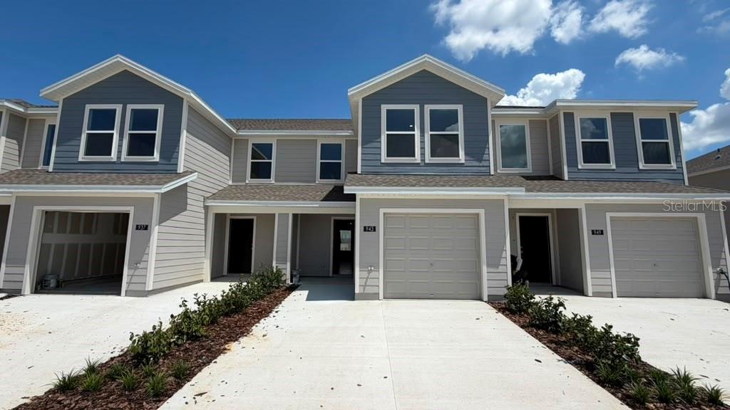 Brand-new Lennar Crestone II townhome for rent in the highly desirable Grandview community! This beautiful 3-bedroom, 2.5-bath home with a 1-car garage features an open-concept layout, a modern kitchen with quartz countertops, stainless steel appliances, and a spacious owner's suite with a walk-in closet. Enjoy the convenience of a washer and dryer, smart home features, energy-efficient construction, and a private patio. Community amenities include a resort-style pool, playground, and dog park. Ideally located just minutes from Posner Park, shopping, dining, I-4, Highway 27, ChampionsGate, and Walt Disney World. Move-in ready! Rent includes lawn maintenance. Don't miss the opportunity to live in one of Davenport's newest and fastest-growing communities. Available now for $2,350/month.