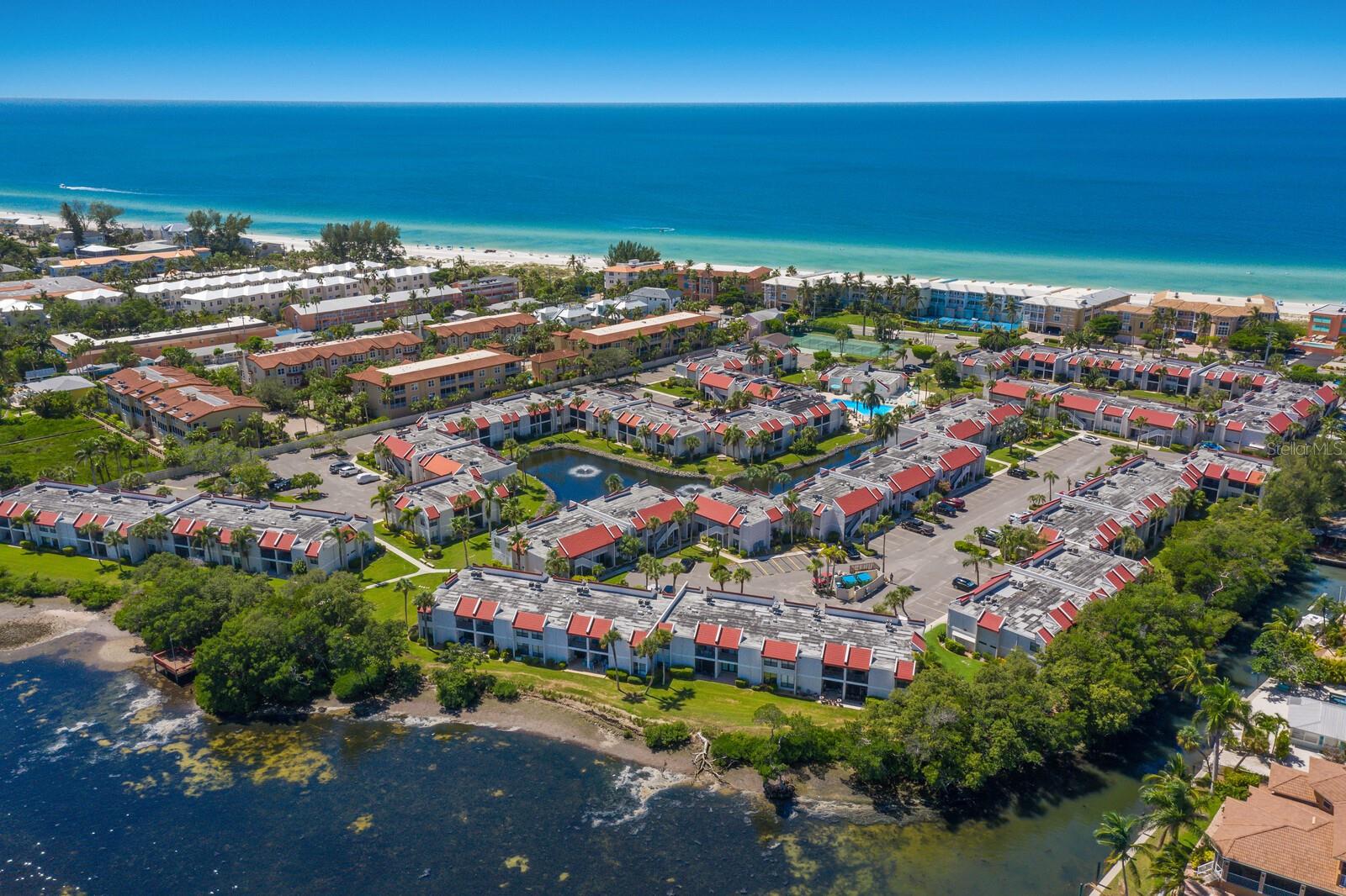 Step into coastal luxury living at its finest with this exquisite turnkey condo unit nestled between the serene waters of Palma Sola Bay and the majestic Gulf of Mexico on Anna Maria Island.

Indulge in the epitome of waterfront bliss as you revel in the leisurely sight of boats gracefully gliding by from the comfort of your own lanai porch. With two bedrooms, two bathrooms, and 1,080 square feet of meticulously designed space, this retreat promises the ultimate in convenience and relaxation.

Savor the culinary delights crafted in the fully equipped kitchen boasting ample cabinets and state-of-the-art appliances. Retreat to the primary bedroom oasis featuring an ensuite bathroom and a sprawling walk-in closet, offering a sanctuary of tranquility and luxury.

Elevating the experience further, this haven boasts numerous upgrades including a cutting-edge 3M water filtration system, recently replaced refrigerator and washer, as well as updated lighting fixtures throughout. Rest easy knowing that the HVAC system was replaced just two years ago, ensuring optimal comfort year-round.

Embrace the exclusive lifestyle with access to a plethora of community amenities including a Bocce ball court, fitness room, sauna, shuffleboard courts, and clubhouse. Unwind by the island's largest heated saltwater swimming pool or explore the pristine beaches via a signal crosswalk just moments away.

For those seeking investment opportunities, take advantage of the on-site rental manager providing comprehensive management services and support. Whether you're seeking a lucrative rental income or a personal sanctuary, this property offers the perfect blend of luxury and convenience.

Embark on endless adventures with convenient access to Gulf and Bay fishing spots, bike paths, and local shops, while the nearby Historic Bridge Street area beckons with its array of dining and entertainment options.

Seize the seaside dream and make this turnkey condo unit at Runaway Bay your coastal sanctuary today. Live the luxury lifestyle you deserve amidst the breathtaking beauty of Anna Maria Island.