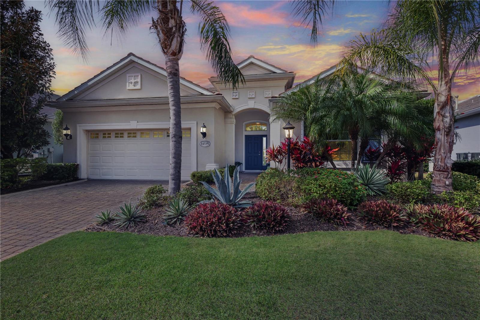 Beautifully maintained three-bedroom residence with a dedicated office/den and two-and-a-half bathrooms, thoughtfully updated and designed for comfortable everyday living. The fully remodeled kitchen (2023) showcases elegant marble countertops, a new kitchen faucet, reverse osmosis system, and modern finishes, creating a bright and inviting space ideal for both entertaining and daily use. The open layout flows seamlessly to the outdoor living area, where a sparkling pool overlooks peaceful water views, offering a serene setting for relaxing or hosting guests. The conveniently located half bath doubles as a lanai bath, providing easy access for poolside living. Recent enhancements, including a new pool pump and refreshed landscaping (2025), further elevate the outdoor space. The spacious primary suite features direct access to the lanai, dual walk-in closets, dual vanities, a walk-in shower, and a private water closet, creating a comfortable and well-appointed primary space. An oversized office/den offers exceptional flexibility to fit your lifestyle — ideal as a home office, fourth bedroom, playroom, or study. Guest bedrooms are privately positioned with a full bathroom conveniently located between them, while new flooring installed in 2024 throughout the bedrooms and den adds a fresh, cohesive feel. Additional improvements include new light fixtures (2024), new blinds and window treatments (2025), a 2025 HVAC system, and a 2025 water heater, providing both style and peace of mind. Located in the highly sought-after, gated community of Lakewood Ranch Country Club East, residents enjoy private roads, three community pools, a fitness center, and a clubhouse. Centrally located near shopping, dining, restaurants, major airports, and more. Optional country club membership provides access to four championship golf courses, three restaurants, pickleball, tennis courts, and a full suite of resort-style amenities.