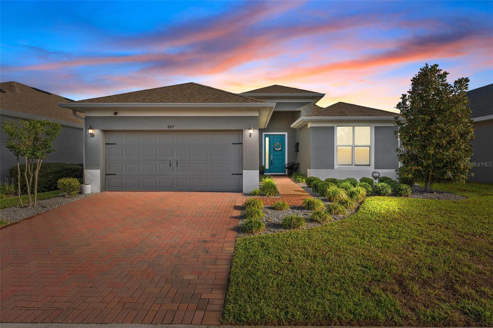 JUST APPRAISED - WELCOME TO YOUR NEW HOME IN THE TRANQUIL COMMUNITY OF COMPASS LANDING! This must-see home, built
in 2021, offers 3 bedrooms and 2 bathrooms and has been meticulously maintained. Step inside to an open, bright floor plan with wood plank tile
flooring throughout—for easy upkeep and a modern look. The kitchen is a chef’s dream, featuring staggered upper cabinets with crown molding,
ample storage, a large island with sink and breakfast bar, and quartz countertops. Stainless steel appliances are included. The utility room off the
kitchen includes a sink, custom cabinetry, and newer washer and dryer. The spacious primary suite features a large walk-in closet with custom
shelving and a bathroom with double sinks and a frameless glass shower enclosure. Additional highlights include a 2-car garage and a fully vinyl
fenced backyard with two 5-foot gates. Ceiling fans, a 16 SEER A/C system, double-pane windows, and energy-efficient solar panels help reduce
electricity costs. Enjoy outdoor living under the covered lanai with extended brick pavers—perfect for relaxing or entertaining. The neighborhood
features a central park and playground and is conveniently located near local schools within walking distance. Blue Spring State Park is just a
short drive. With easy access to I-4 and AdventHealth Fish Memorial Hospital, commuting, shopping, dining, and beaches are a breeze. A nearby
Sun Rail station adds convenience. Don’t miss this move-in-ready home!