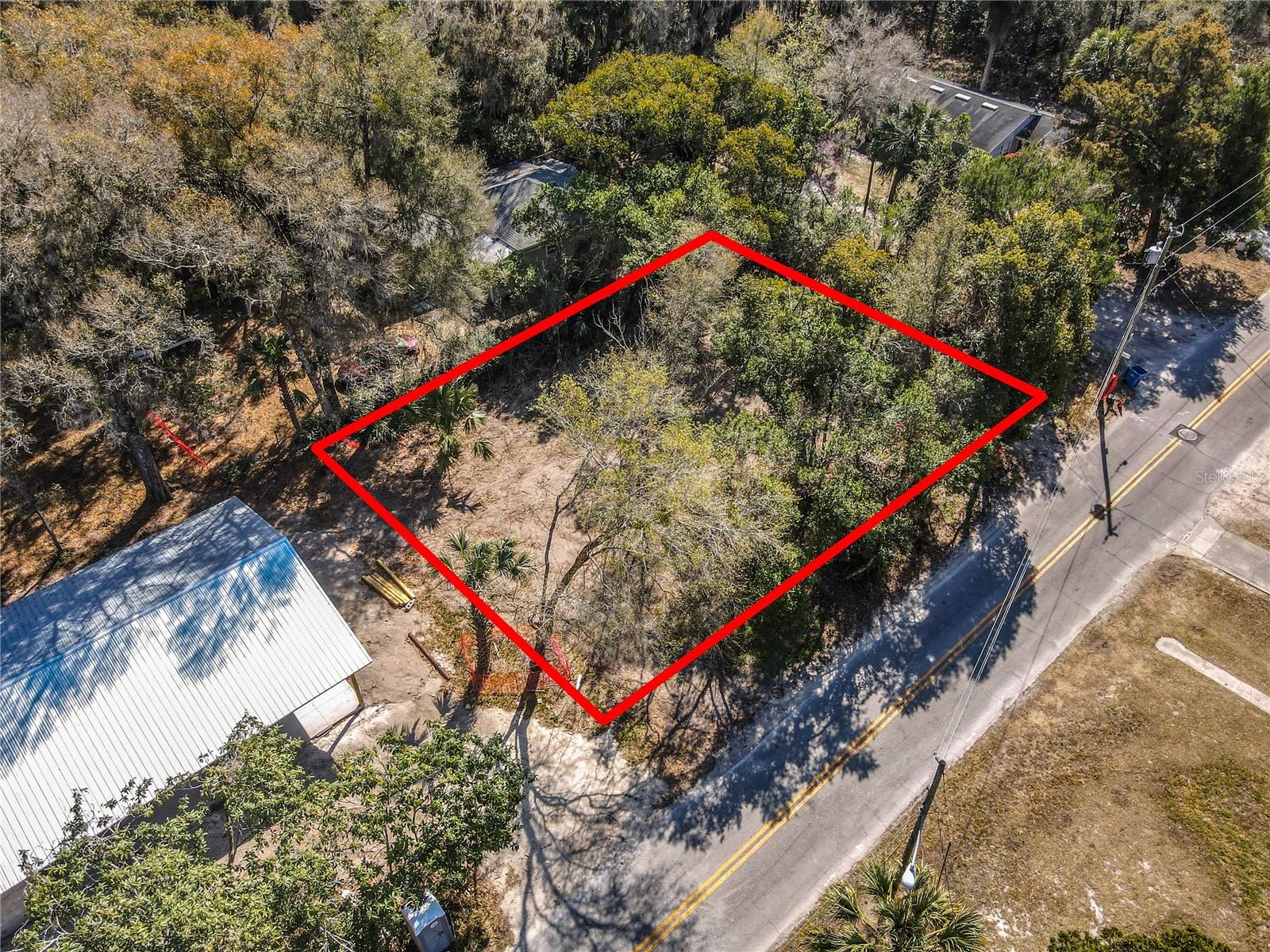 Prime corner lot in DeLand offering an exceptional, ready-to-build opportunity! This approximately 0.20-acre parcel is construction-ready and ideally positioned for maximum curb appeal and accessibility. Located within Volusia County, the property includes approved plans for a thoughtfully designed 2-bedroom, 1-bathroom single-family home featuring approximately 850 square feet of efficient living space. Sewer and city water connections are available. Skip the lengthy approval process — the county has already approved the plans, and the permit is ready to issue. Personalize your finishes and bring your vision to life. This is an ideal opportunity for investors or future homeowners ready to break ground without delay, offering a streamlined path from purchase to construction in a growing and desirable area.
Don’t miss this rare, shovel-ready opportunity in DeLand!