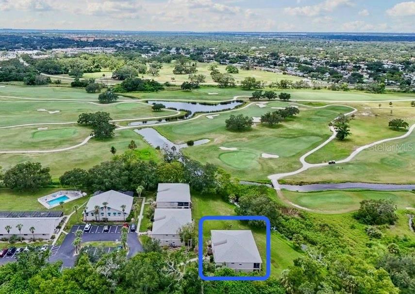 HUGE $50,000 REDUCTION ON THIS NEWLY RENOVATED ground floor 2-bedroom, 2-bathroom condominium with beautiful golf course views, well-located for the utmost of privacy at the end of the serene and well-maintained Hideaway community, just minutes to Downtown Sarasota. INCREDIBLE VALUE for this move-in-ready residence which offers the perfect blend of modern comfort, efficient design, and a picturesque setting with direct views of the lush newly redesigned Bobby Jones Golf Course from your screened-in patio—ideal for morning coffee or evening relaxation. Step inside to discover a freshly renovated interior including brand-new luxury vinyl wide plank flooring, updated kitchen and baths with new cabinetry and stone counters, designer ceiling fans with lights, and new impact windows. The floor plan is both functional and inviting, with a spacious living area, separate dining room, and an open feel that makes entertaining a breeze. The primary suite is generously sized and offers a tranquil golf course view, a large closet, and an updated ensuite bath with stone-topped vanity. The guest bedroom is perfect for visitors or a home office, with access to an updated and well-appointed second full bath. Additional highlights include a brand-new full-size washer and dryer in-unit, new water heater, abundant closet space and plenty of natural light throughout. This unit also comes with two prime parking spaces located just steps from the front door. The Hideaway offers a great lifestyle with lush landscaping, mature oak trees, two community pools, and scenic walking trails. The low-maintenance condo fee includes exterior maintenance as well as water, sewer, trash, pest control, and pool service—providing true ease of ownership. With no CDD fees, no age restrictions, and flexible leasing policies, this community is ideal for full-time living, a seasonal getaway, or a smart investment opportunity. Perfectly situated close to Downtown Sarasota, the Legacy Trail, SRQ Airport, I-75 and some of Florida’s most celebrated Gulf Coast beaches, this gem combines location and low-cost living in one of Sarasota’s most convenient communities.