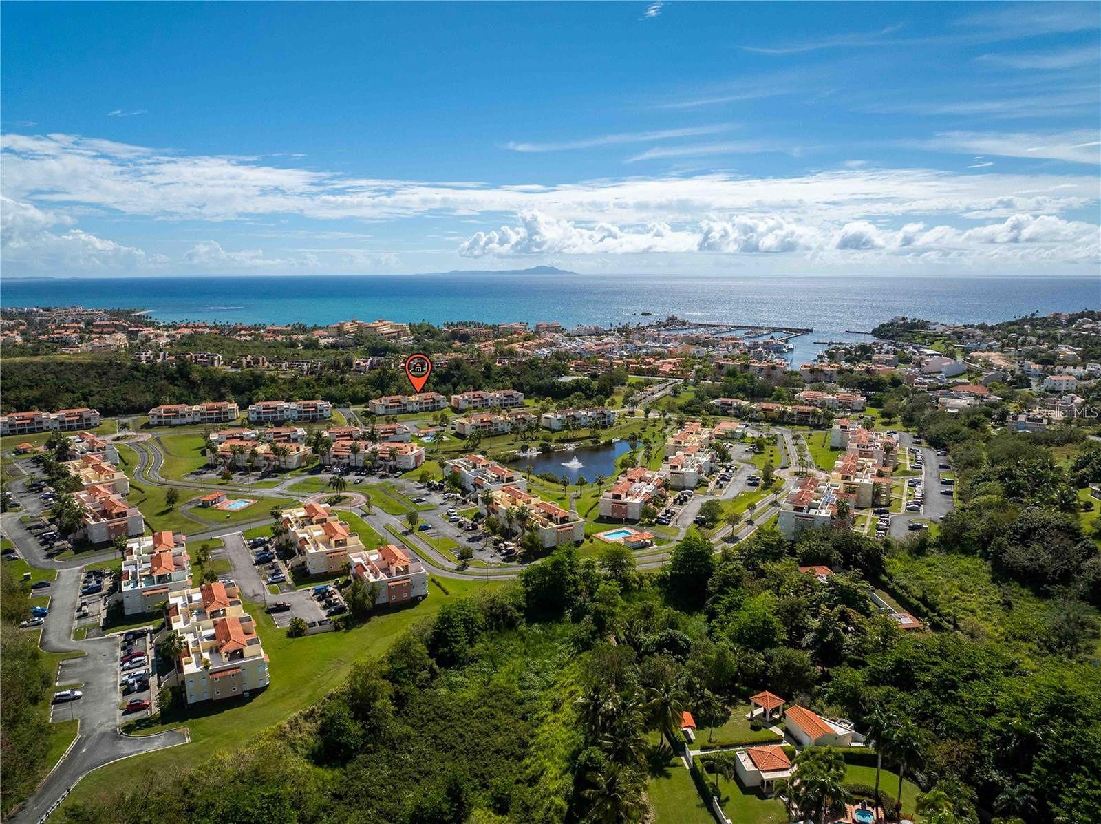 Harbour Lakes at Palmas del Mar offers resort-style living in this beautifully maintained 3-bedroom, 2.5-bath ground-floor residence with approximately 1,800 square feet of living space. Fully furnished and equipped, this spacious home is move-in ready and ideal as a primary residence, vacation getaway, or investment property.

The open-concept layout features comfortable living and dining areas, a well-appointed kitchen, and generous bedrooms designed for relaxation and convenience. Hurricane shutters throughout provide added security and peace of mind.

Included with the property are two deeded parking spaces and one golf cart, making it easy to enjoy the vibrant Palmas del Mar community, beaches, golf courses, marina, restaurants, and resort amenities.

Experience the perfect combination of comfort, convenience, and Caribbean lifestyle in one of Palmas del Mar’s most desirable communities.